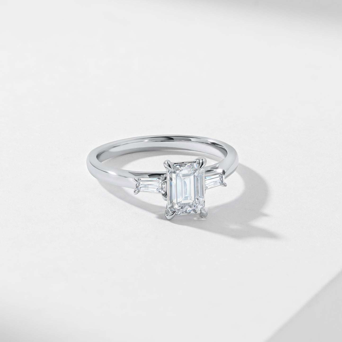 1.5ct Emerald Cut Diamond With Tapered Baguette Shoulders Trilogy Ring 1.62tdw