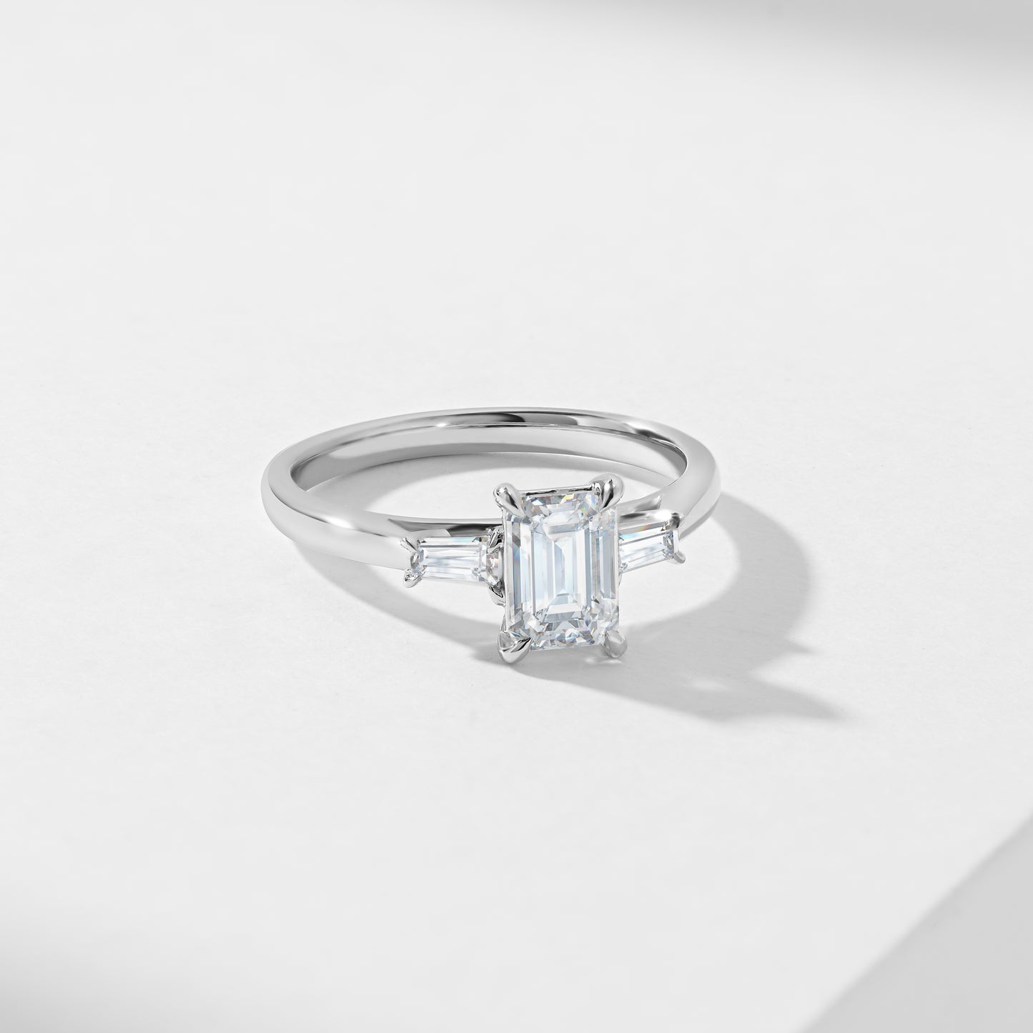 1.5ct Emerald Cut Lab Diamond With Tapered Baguette Shoulders Trilogy Ring 1.62tdw