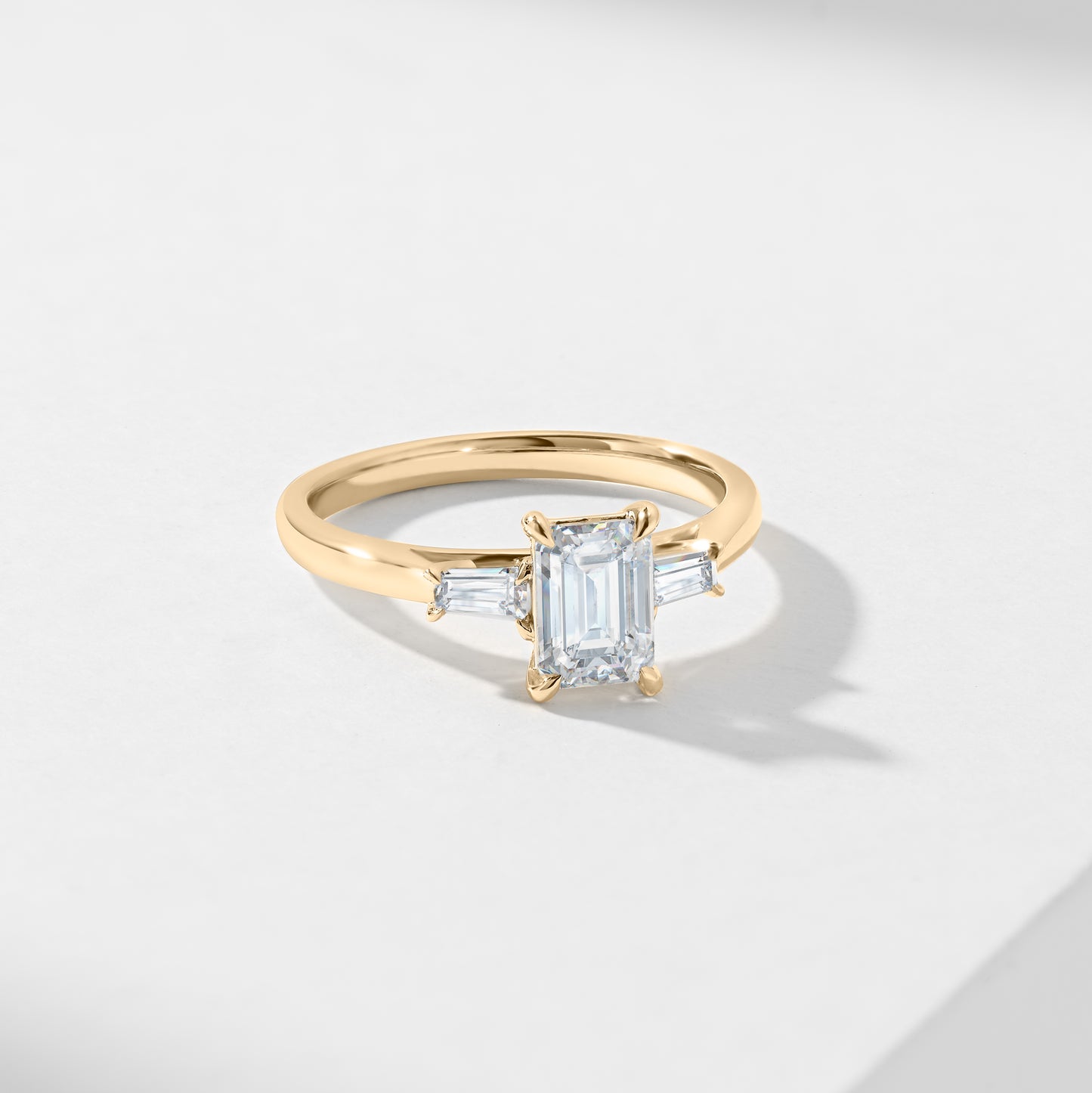 1.5ct Emerald Cut Lab Diamond With Tapered Baguette Shoulders Trilogy Ring 1.62tdw