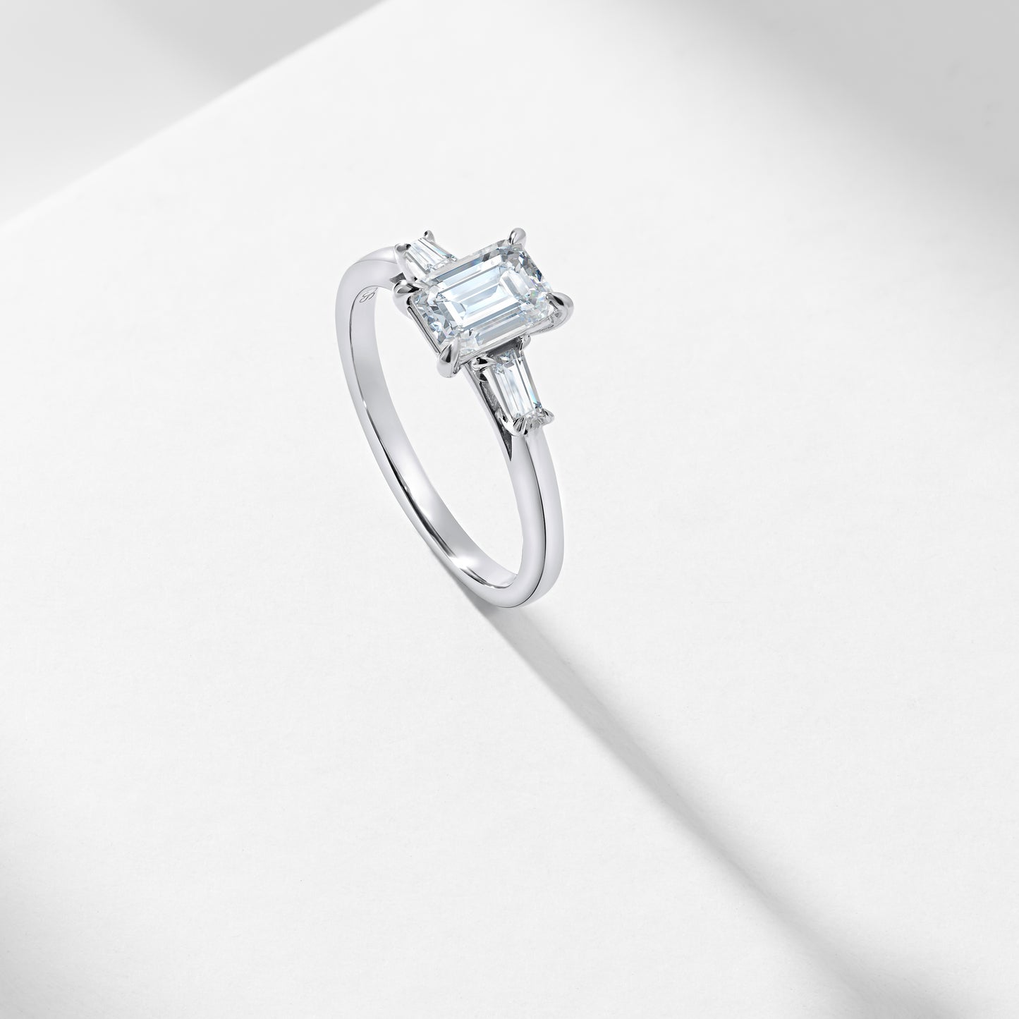 1.5ct Emerald Cut Lab Diamond With Tapered Baguette Shoulders Trilogy Ring 1.62tdw