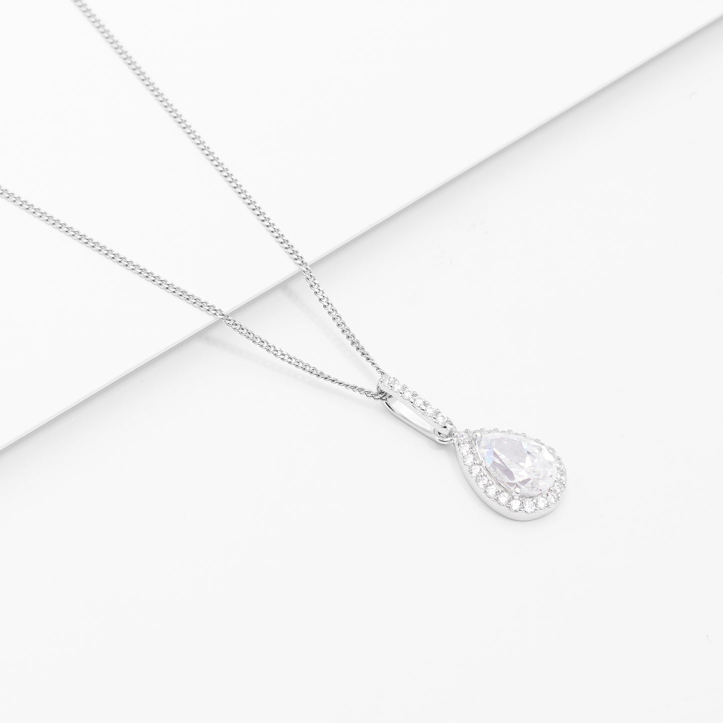 Sterling Silver Pear And Halo Zirconia Pendant