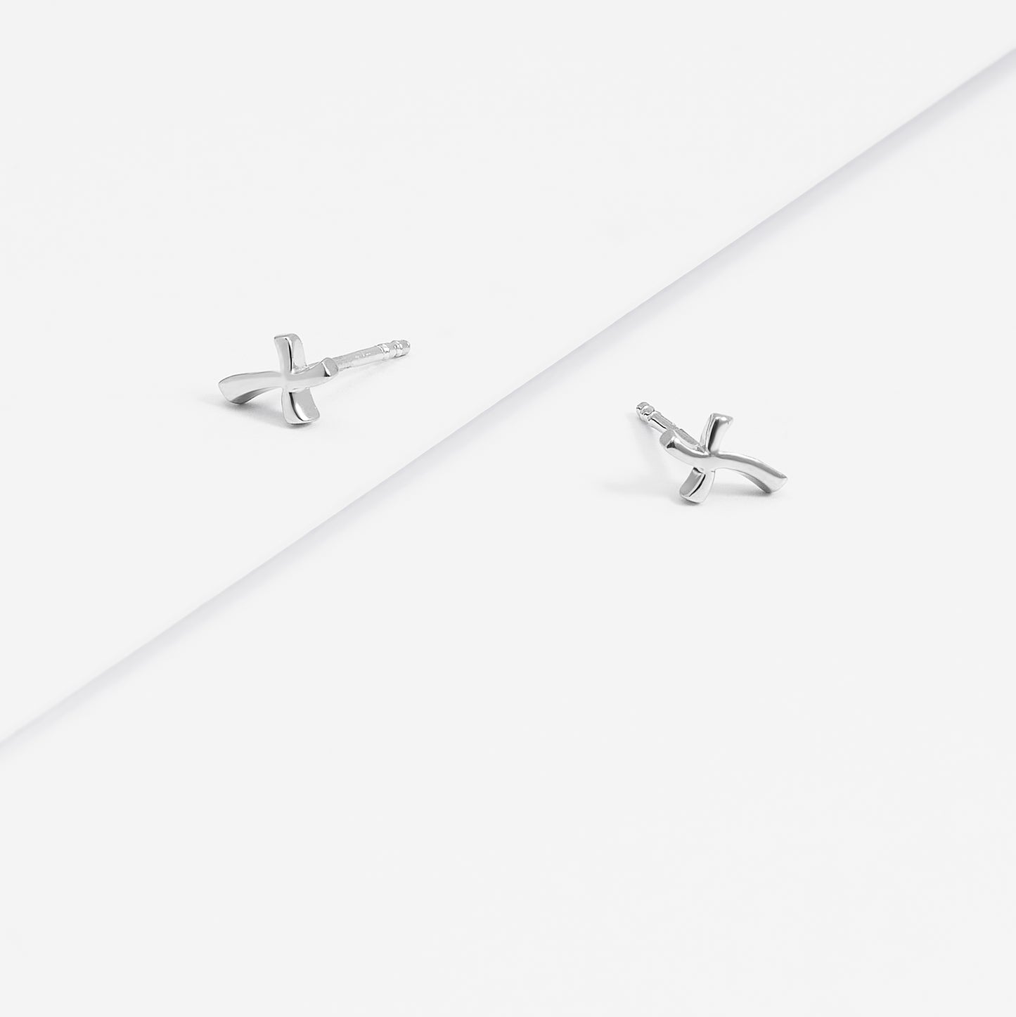 Sterling Silver Plain Wavy Cross Stud Earrings