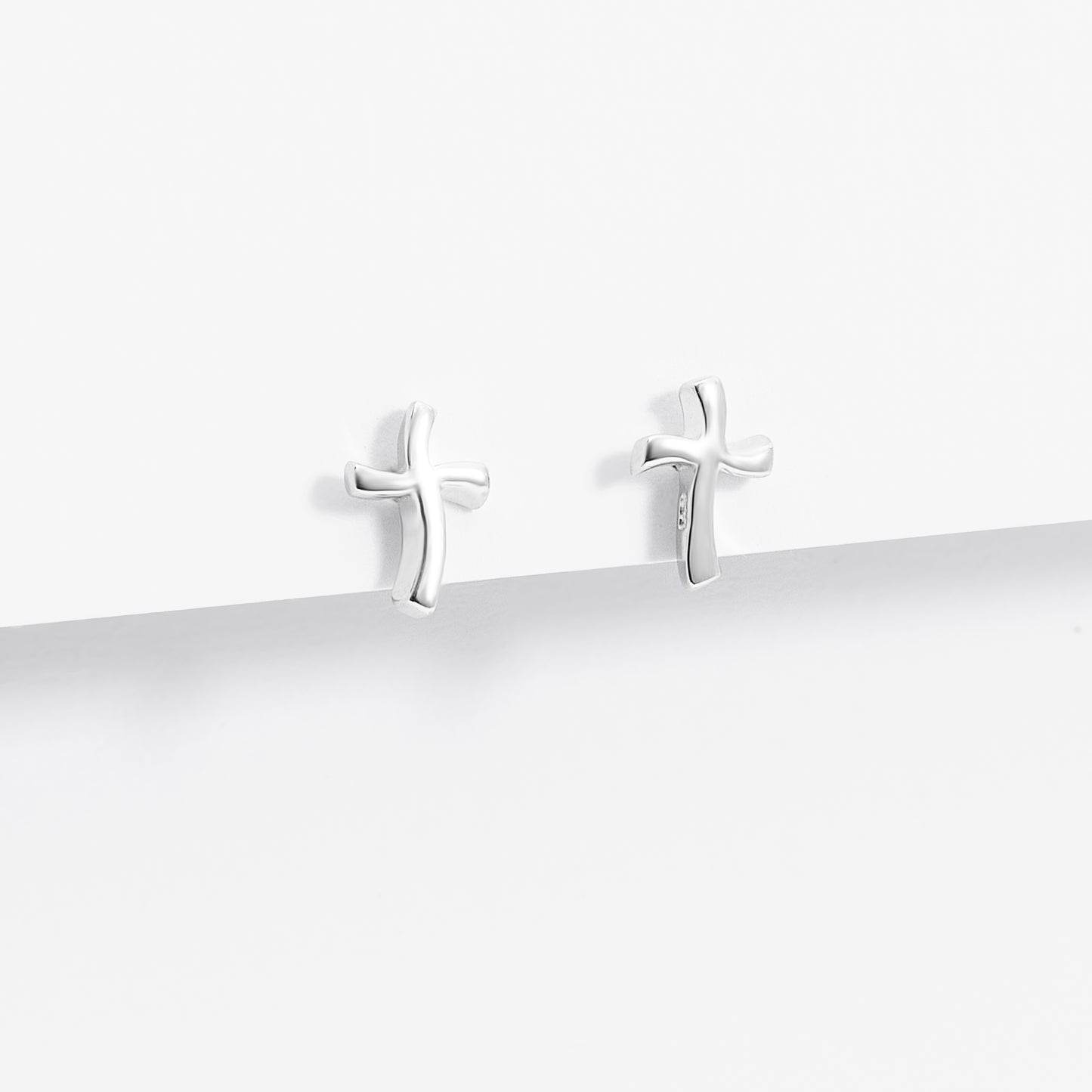 Sterling Silver Plain Wavy Cross Stud Earrings
