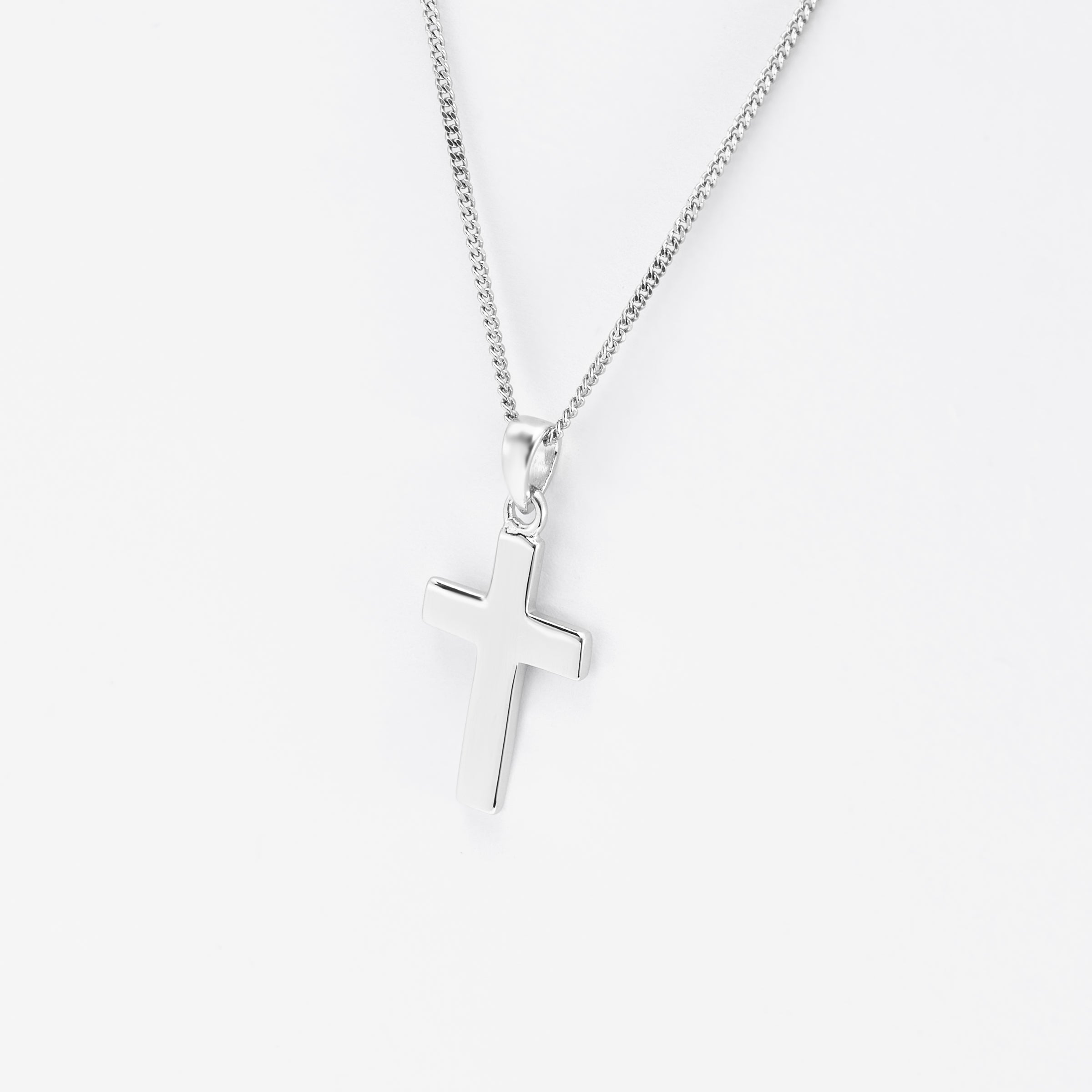Sterling Silver Small Plain Cross Pendant 11x17mm Simon Curwood Jewellers sterling-silver-small-plain-cross-pendant-11x17mm-simon-curwood-jewellers