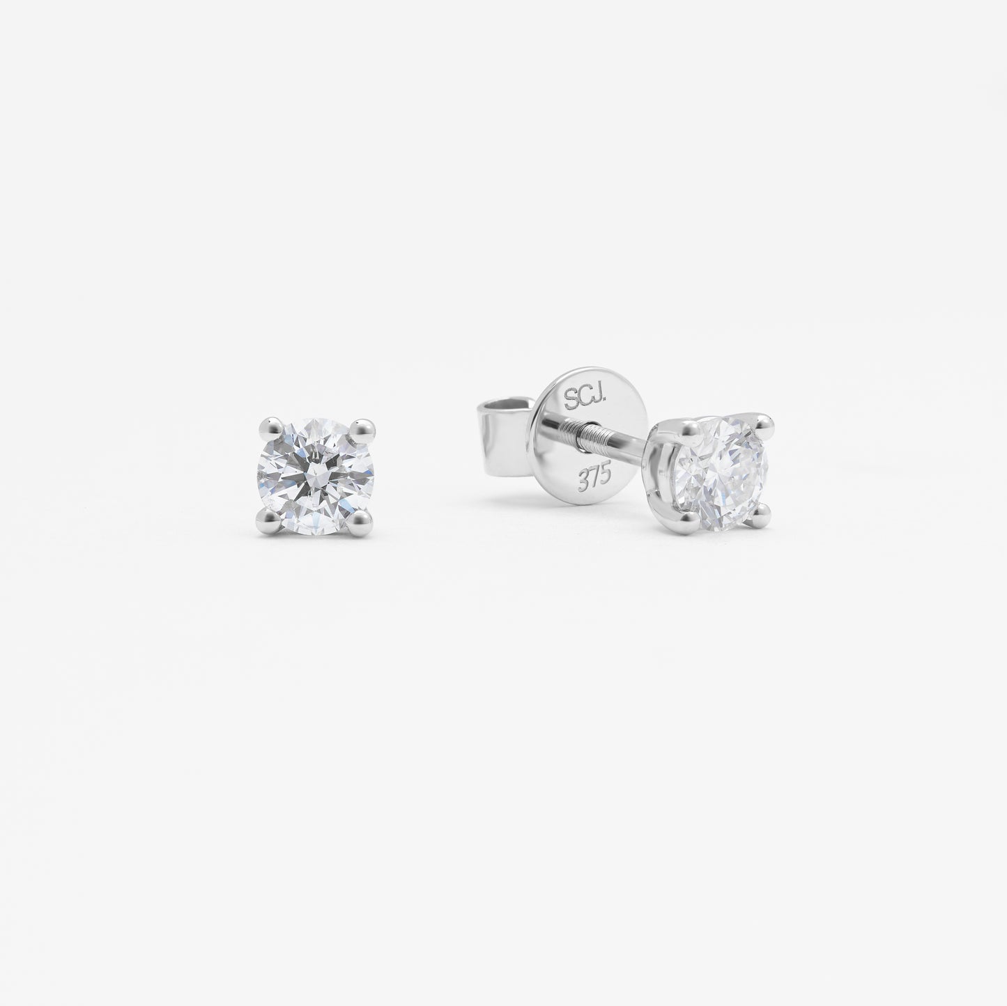 9K White Gold Round Brilliant Diamond Solitaire Stud Earrings 0.50tdw