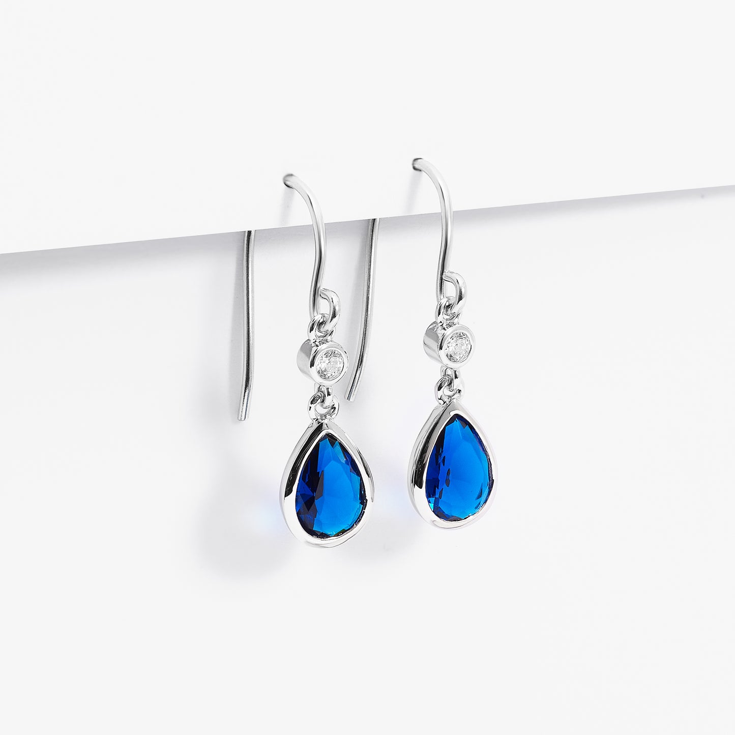 Sterling Silver Blue Pear And Round Zirconia Bezel Shepherd Hook Earrings