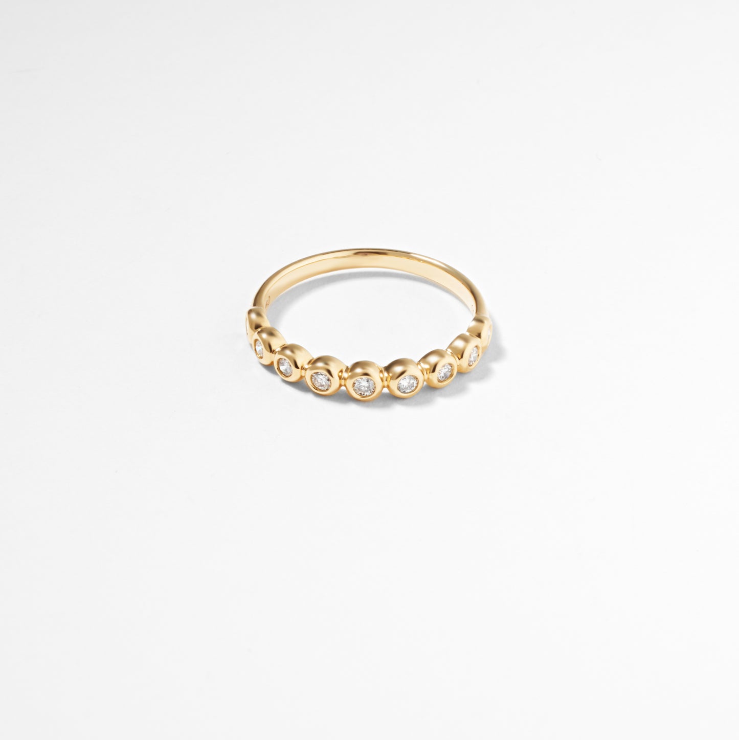 18K Yellow Gold Round Brilliant Diamond Bezel Set Band 0.25tdw