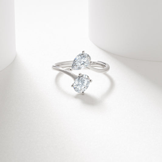 9w 0.7ct oval and pear cut lab diamond claw set toi et moi ring