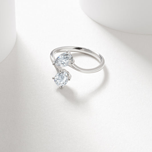 9w 0.7ct oval and pear cut lab diamond claw set toi et moi ring