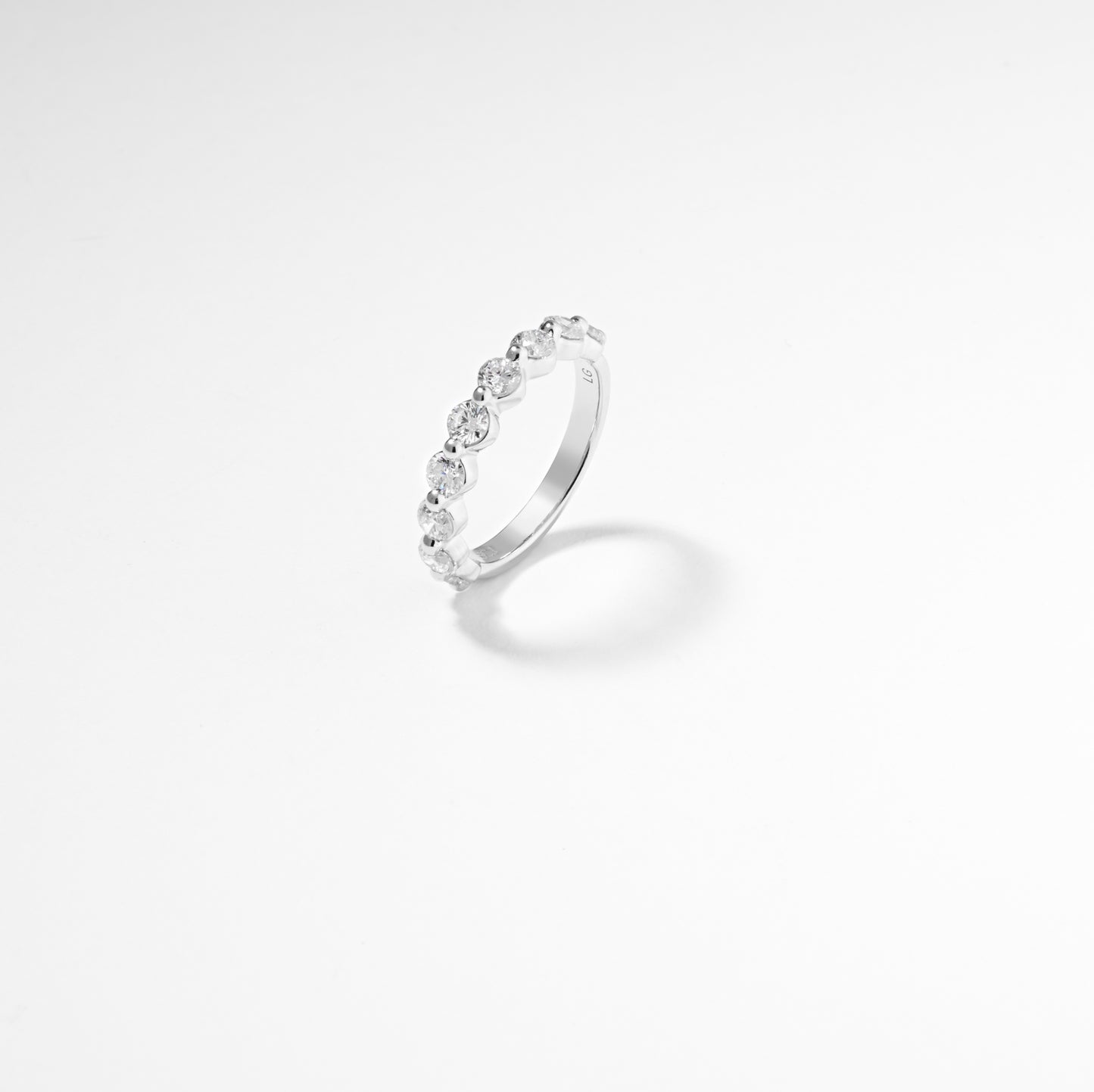 18W round brilliant lab diamond floating set wedder/eternity ring sz O