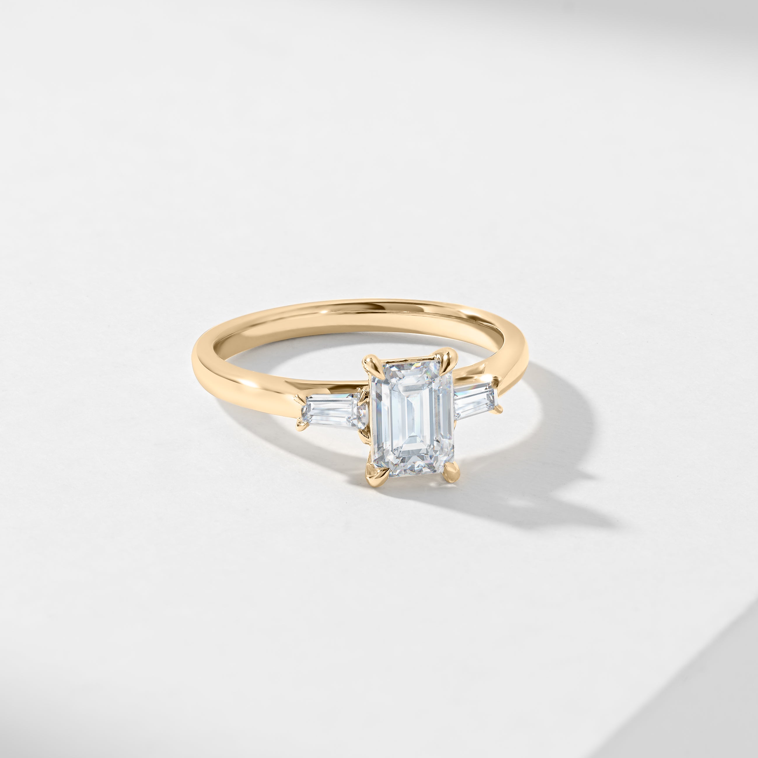 1.5ct Emerald Cut Diamond With Tapered Baguette Shoulders Trilogy Ring 1.62tdw