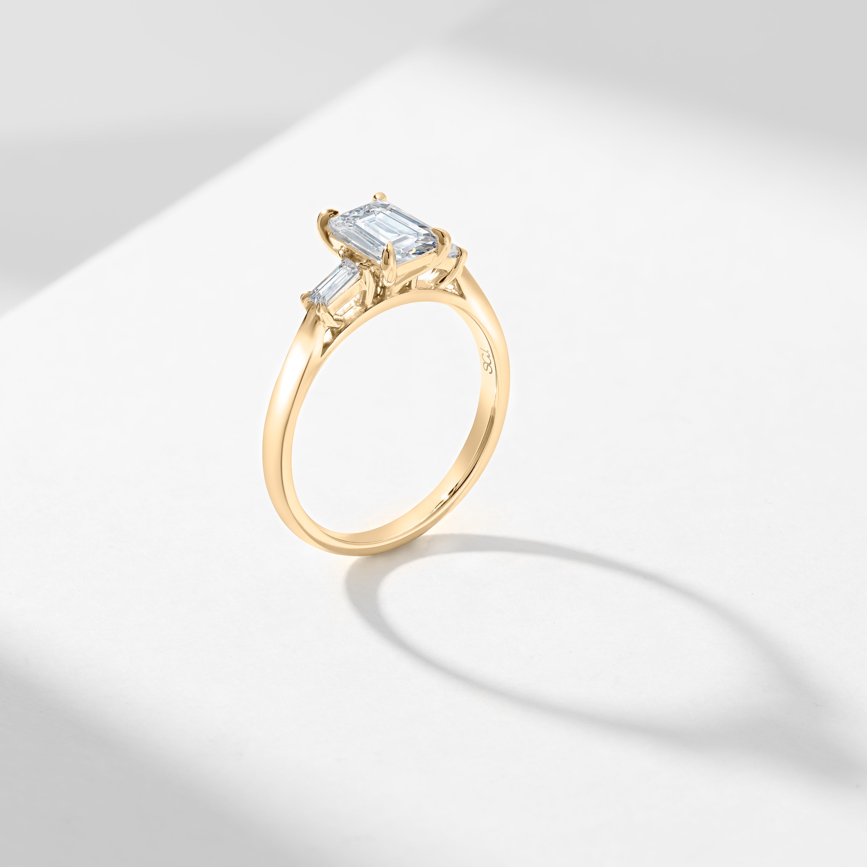 1.5ct Emerald Cut Diamond With Tapered Baguette Shoulders Trilogy Ring 1.62tdw