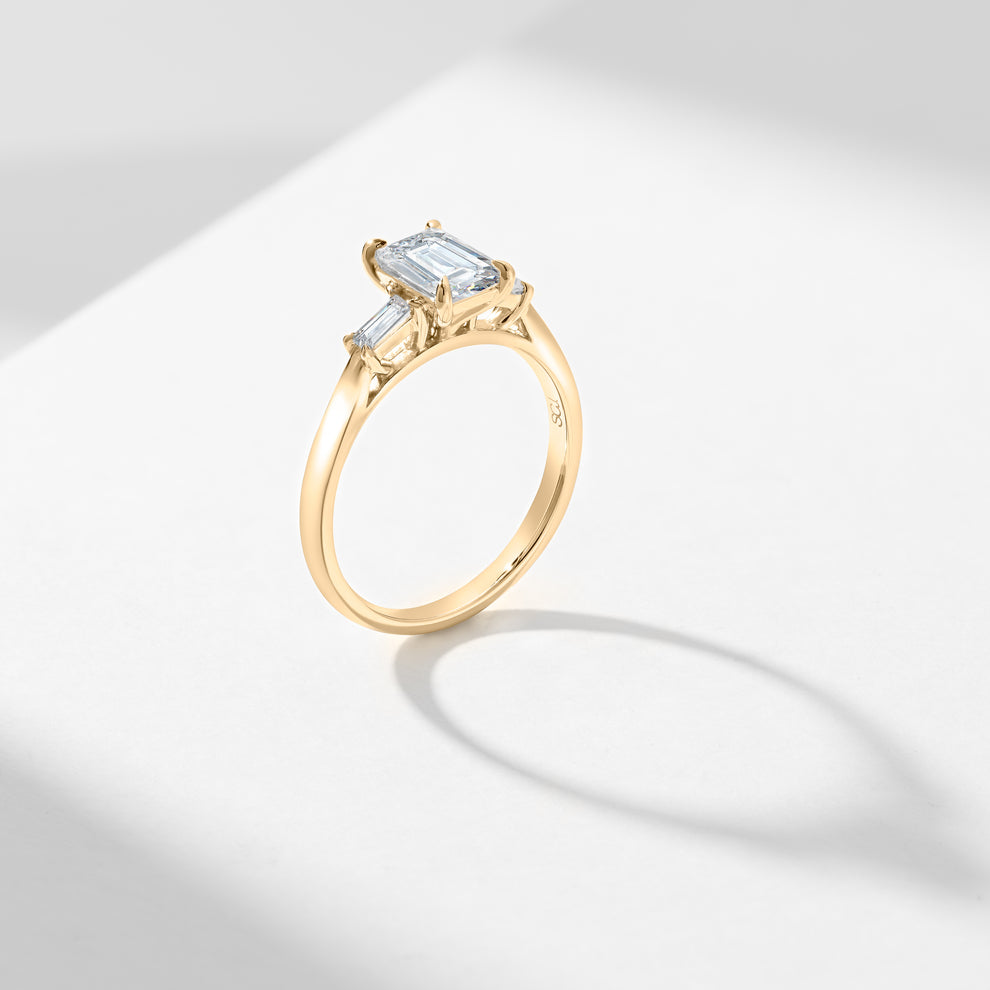 1.5ct Emerald Cut Diamond With Tapered Baguette Shoulders Trilogy Ring ...