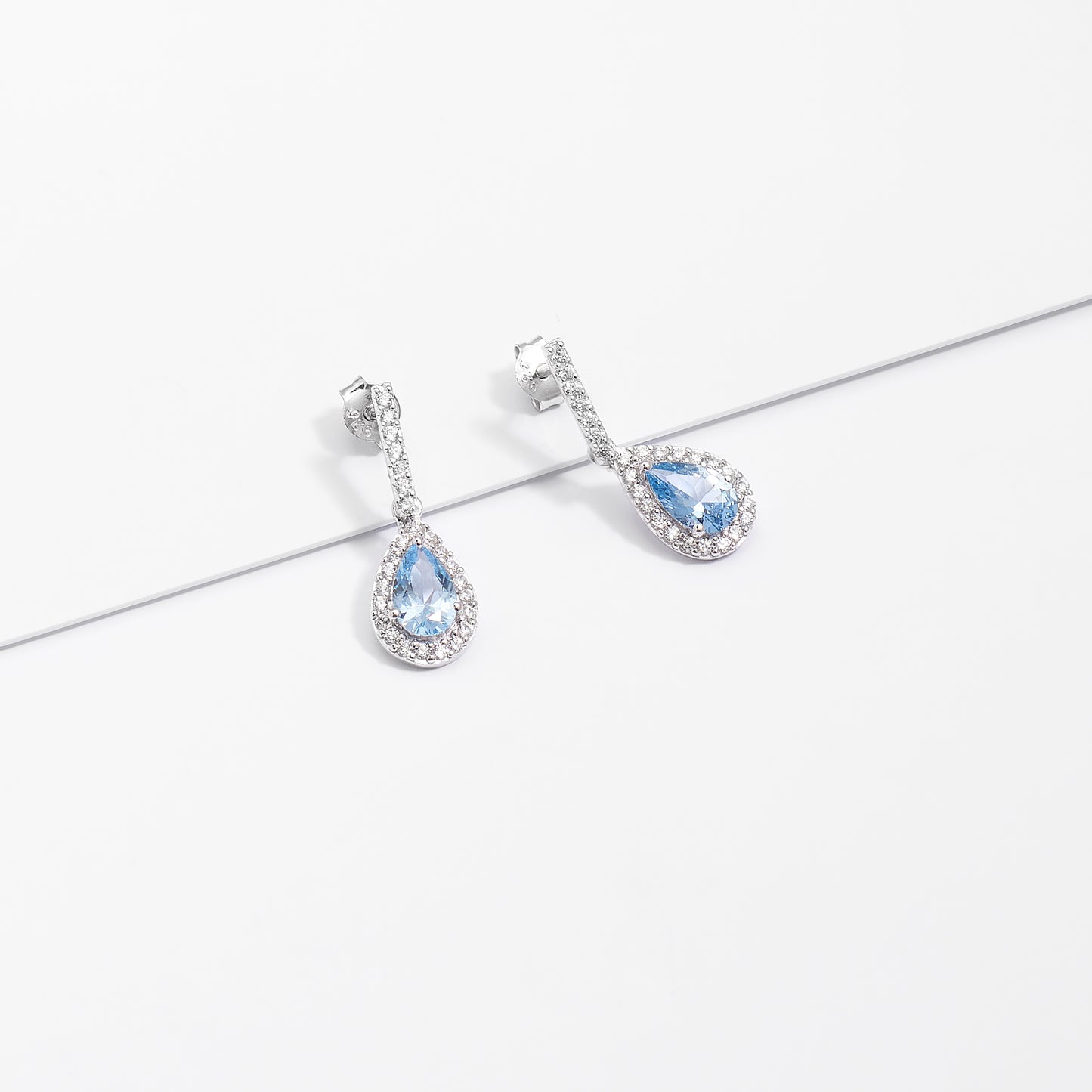 Sterling Silver Pale Blue Pear Zirconia Halo Earrings