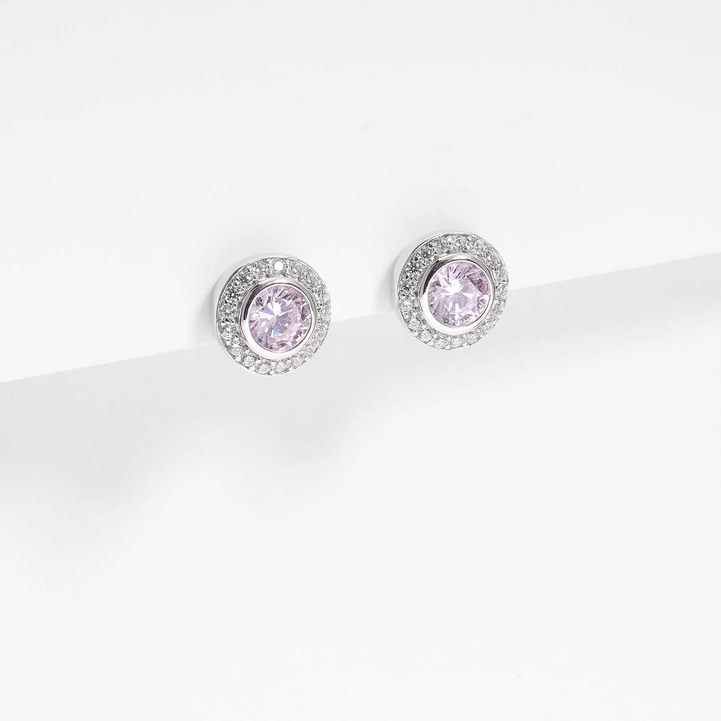 Sterling Silver Bezel Pink Zirconia And Halo Stud Earrings