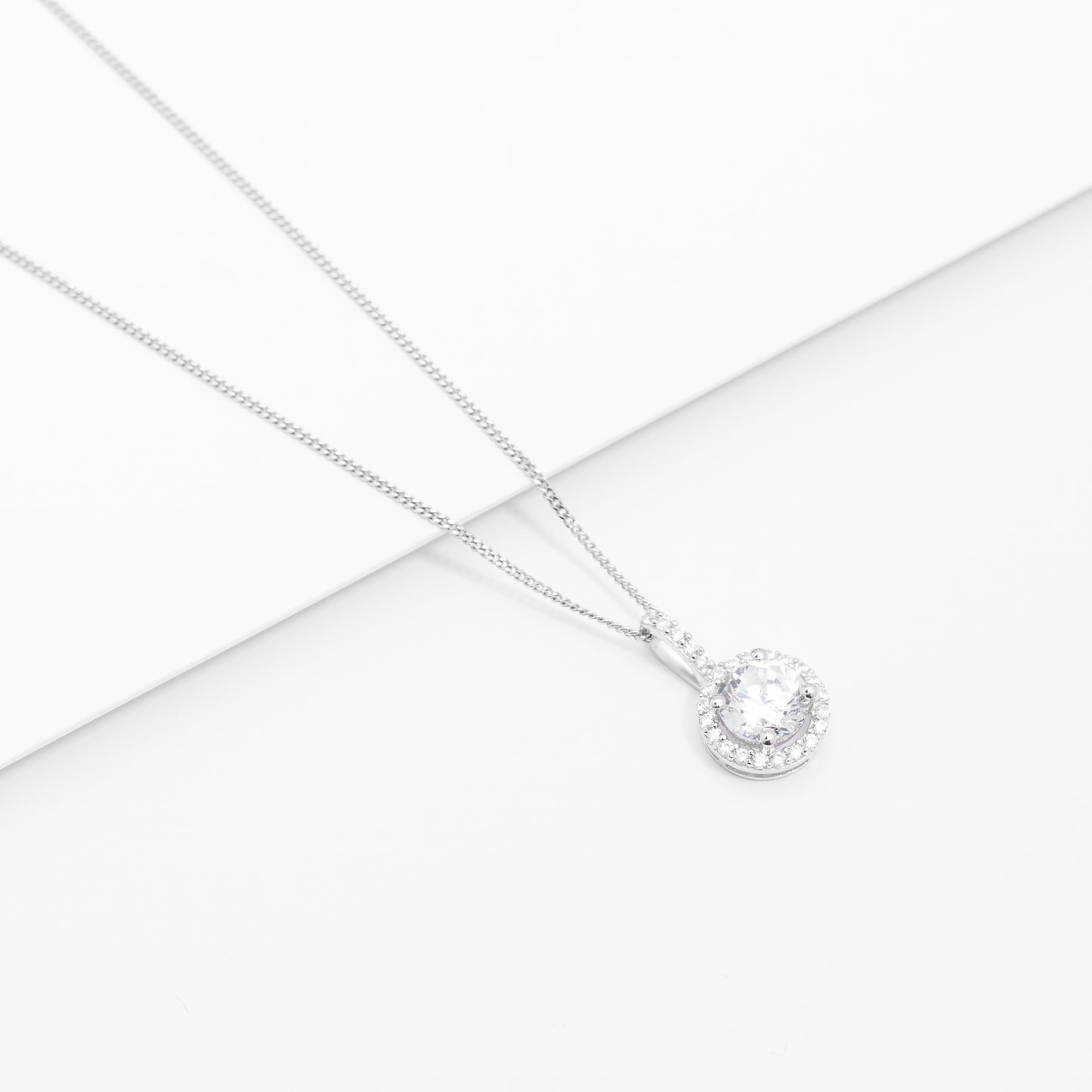 Sterling Silver Zirconia Round Brilliant Solitaire With Halo Pendant