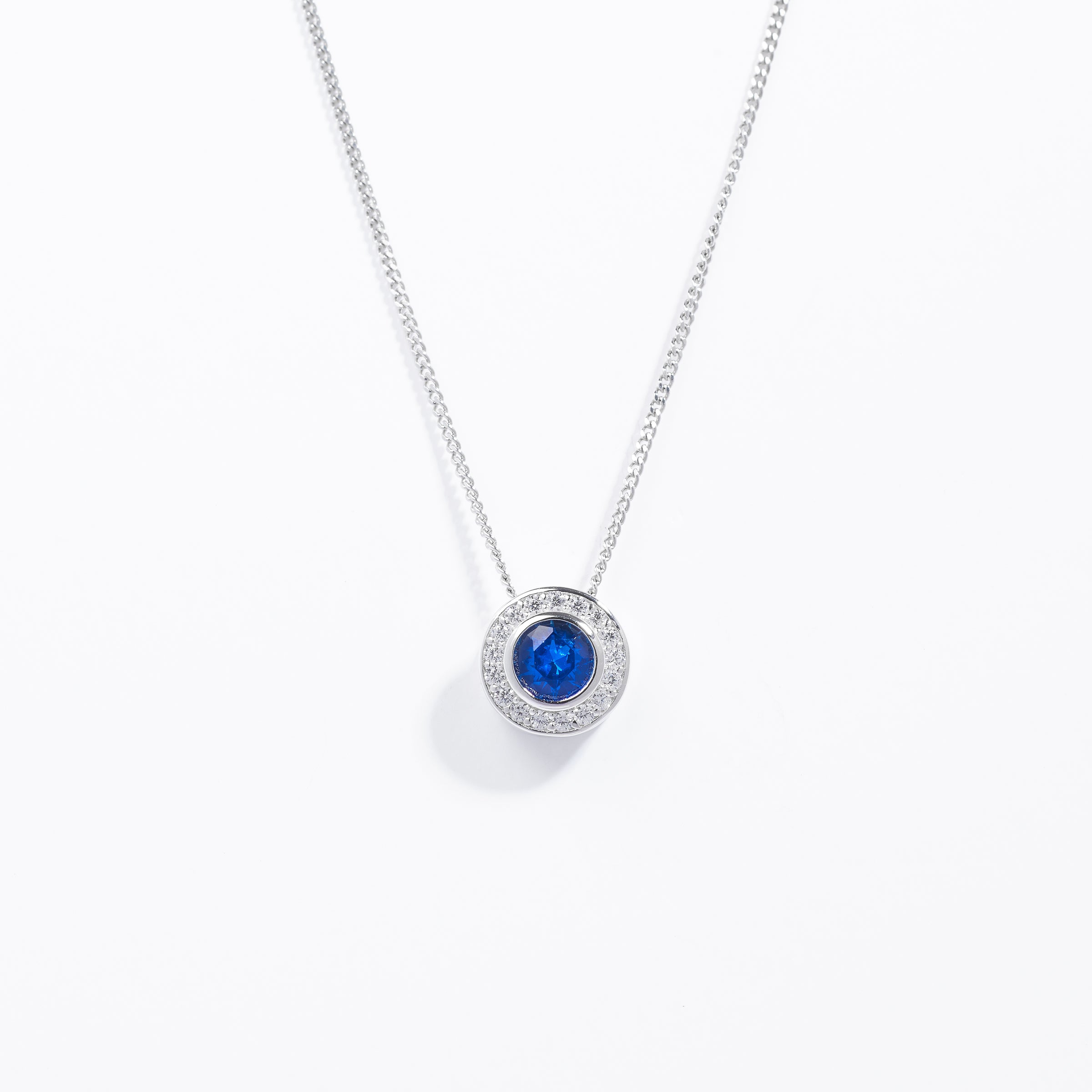 Sterling Silver Bezel Dark Blue Zirconia Halo Slider Pendant