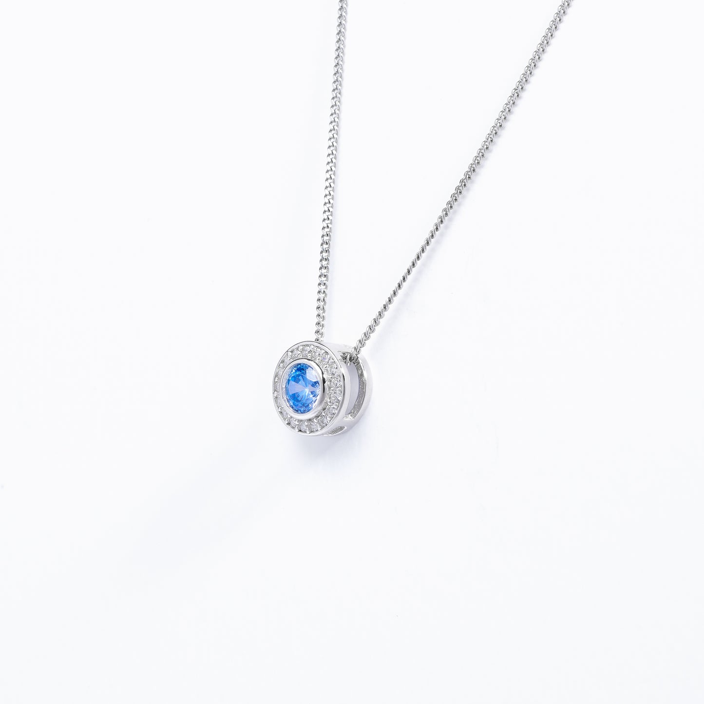 Sterling Silver Bezel Blue Zirconia Halo Slider Pendant