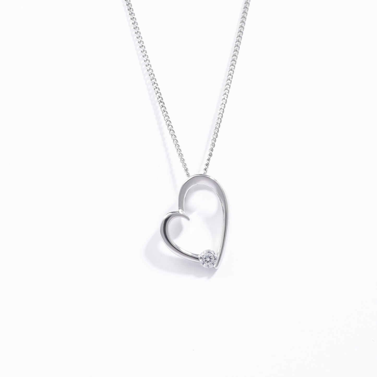Sterling Silver Open Heart Pendant With Floating Zirconia