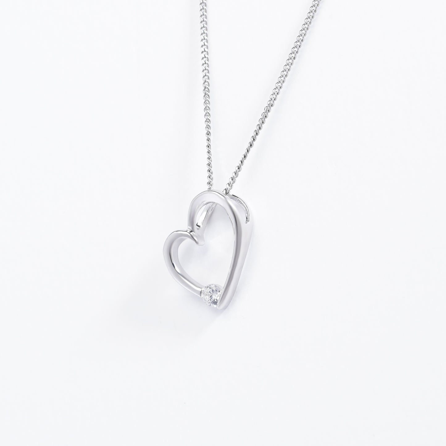 Sterling Silver Open Heart Pendant With Floating Zirconia