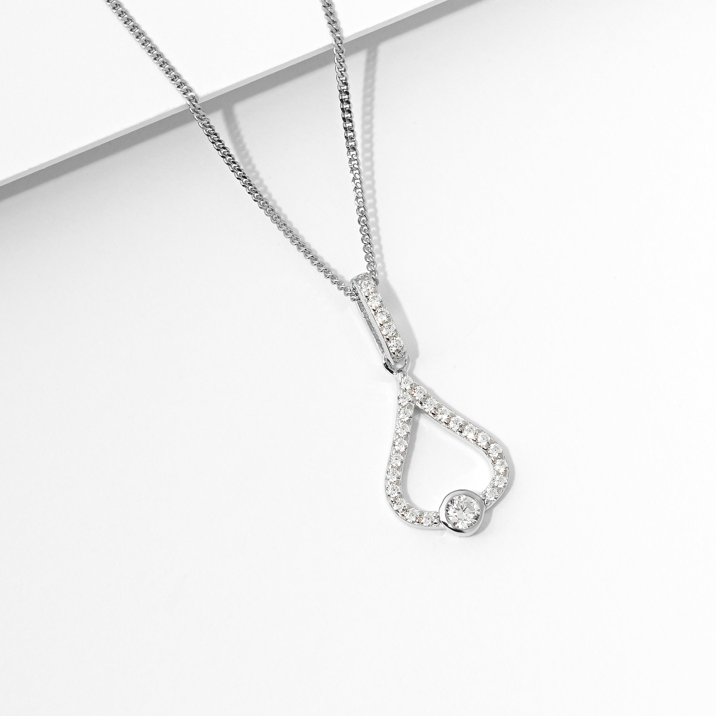 Sterling Silver Zirconia Bezel Open Teardrop Pendant
