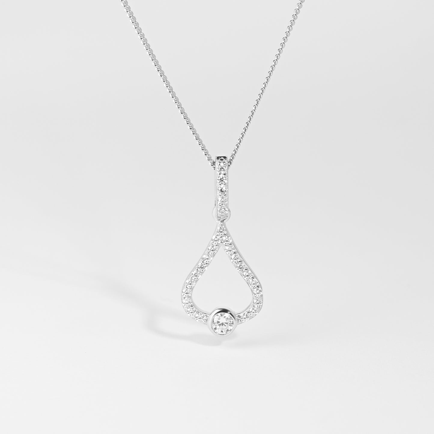 Sterling Silver Zirconia Bezel Open Teardrop Pendant