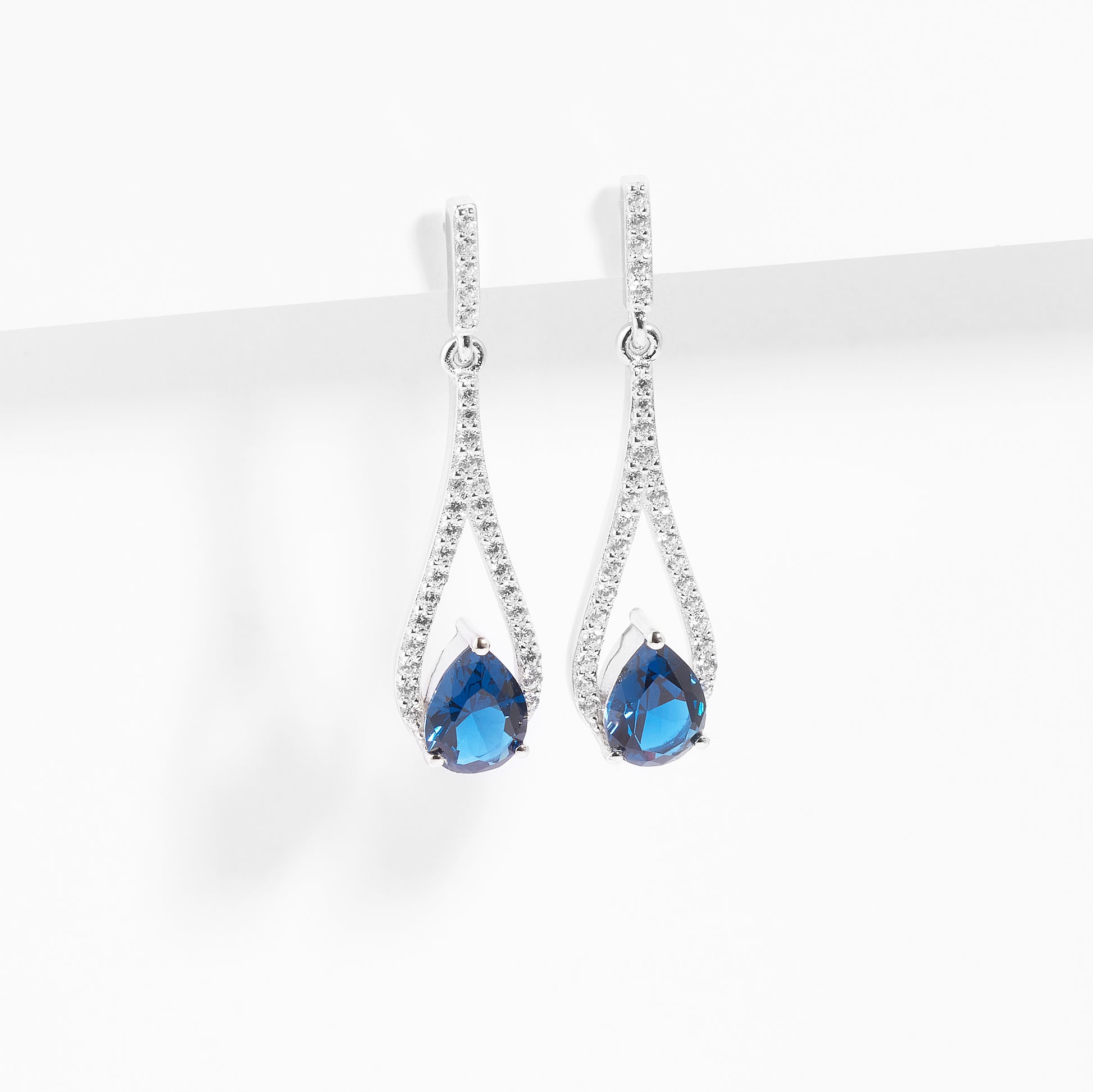 Sterling Silver Zirconia London Blue Pear And White Halo Drop Stud