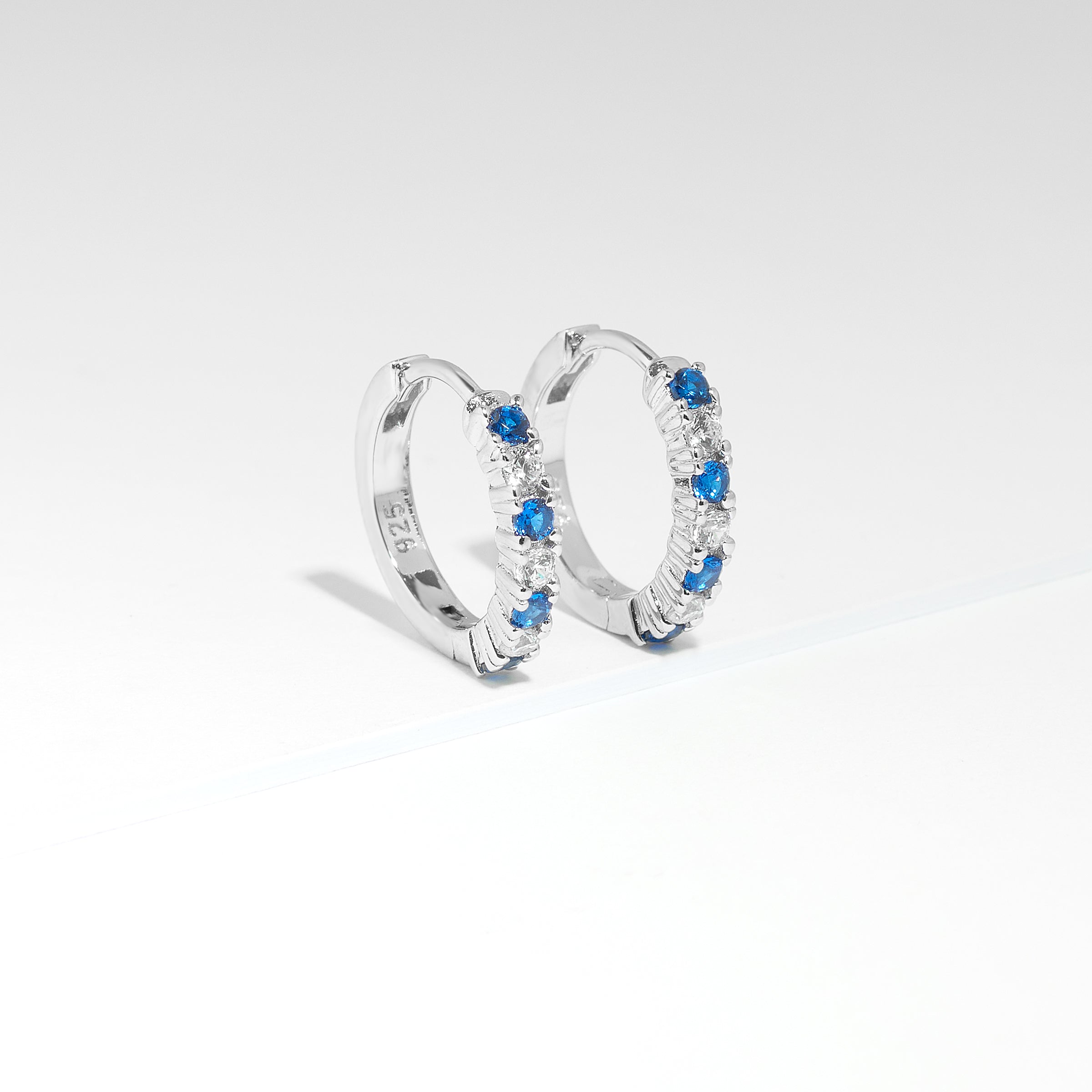 Sterling Silver Blue And White Zirconia Huggie Earrings