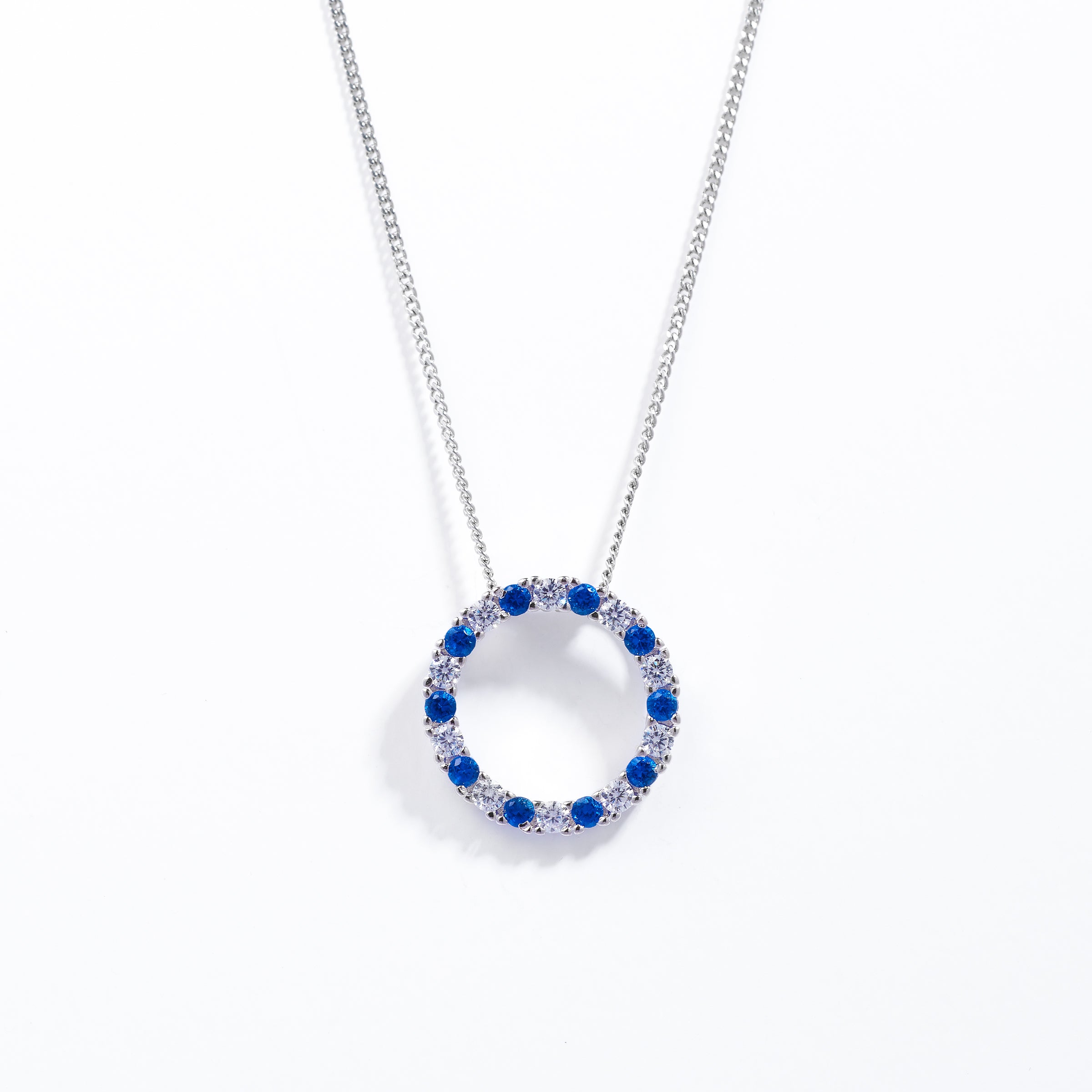 Sterling Silver Blue And White Zirconia Circle Pendant