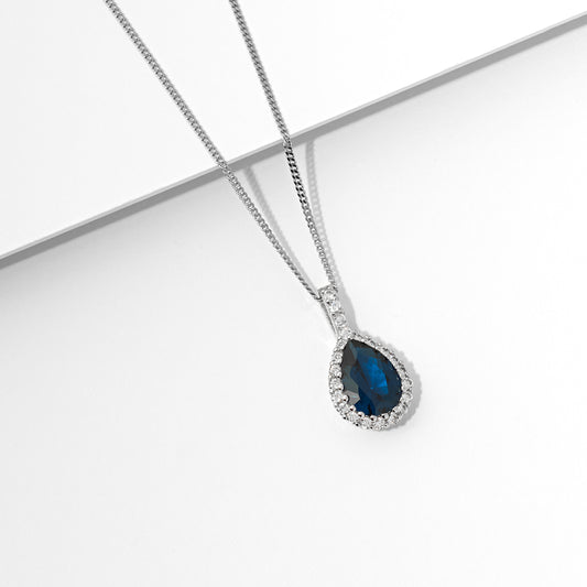 Sterling Silver London Blue Pear And Zirconia Halo Pendant