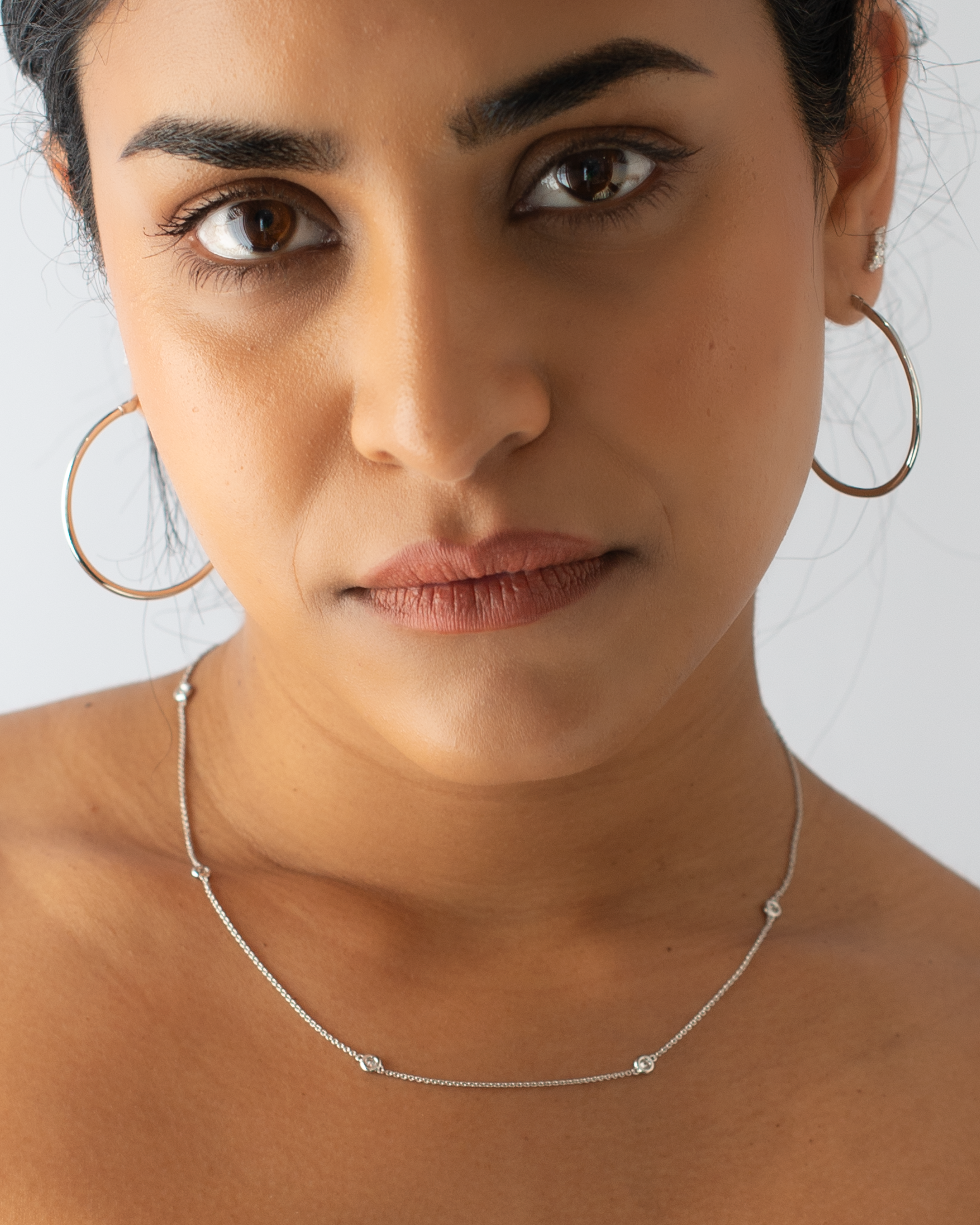9K White Gold Polished Round Hoop Earrings 35mm model shot