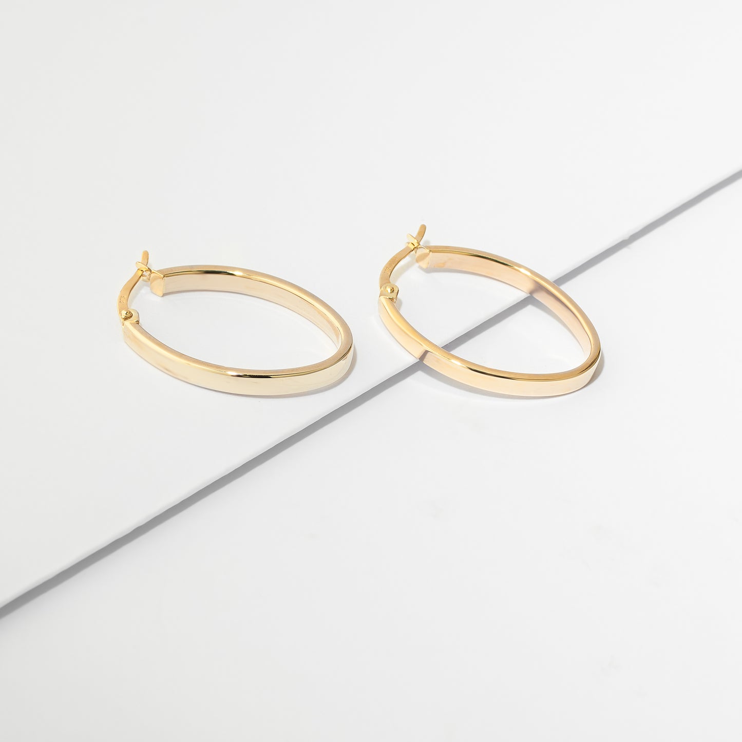 9K Yellow Gold Oval Hoop Earrings 25mm