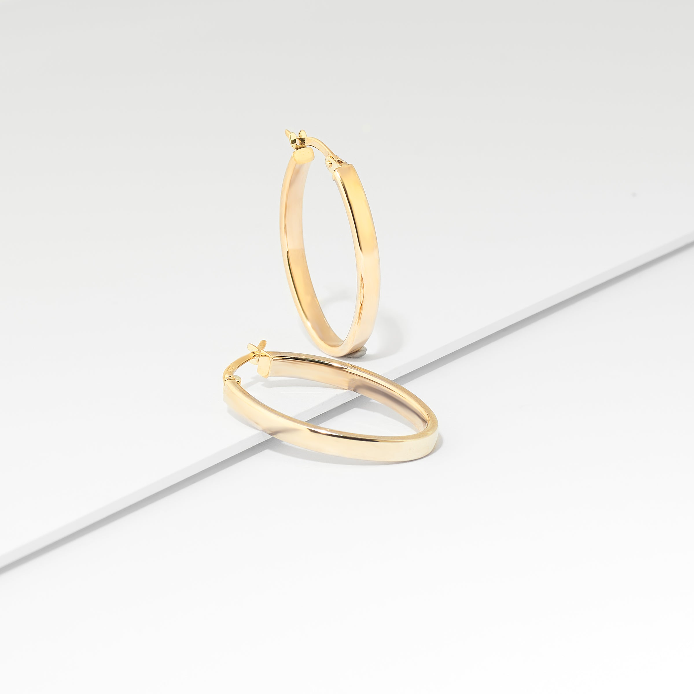 9K Yellow Gold Oval Hoop Earrings 25mm