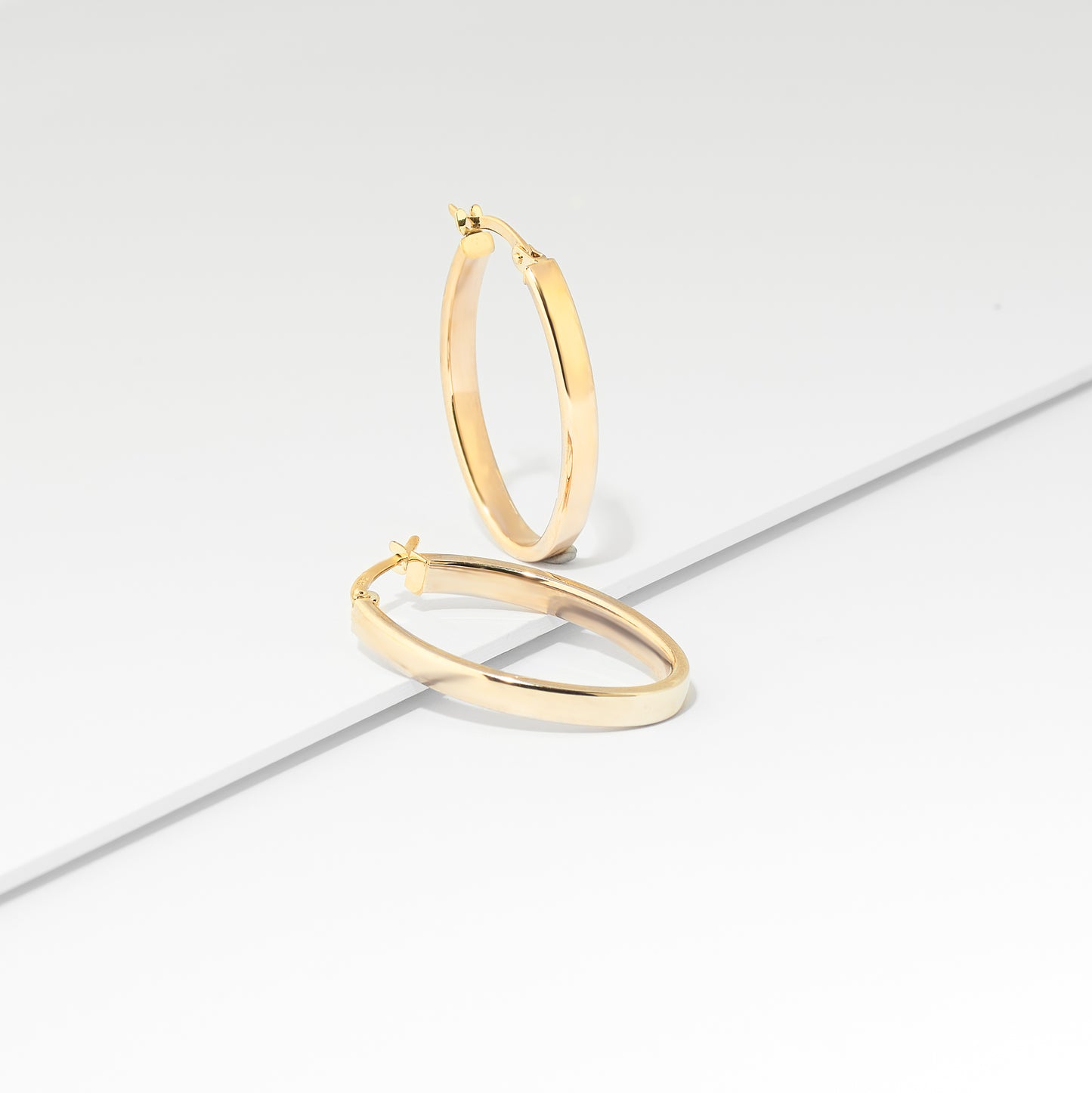 9K Yellow Gold Oval Hoop Earrings 25mm