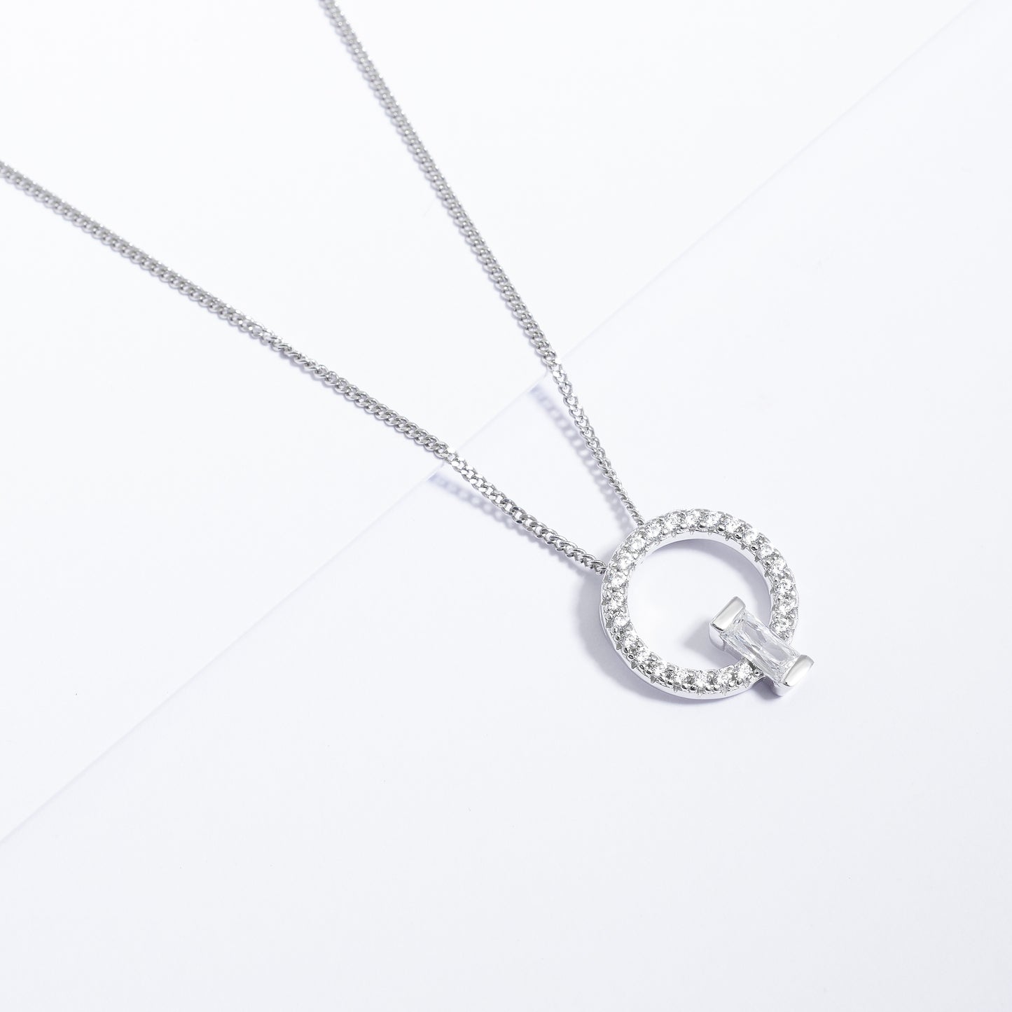Sterlin Silver Zirconia Open Circle Pendant With Baguette