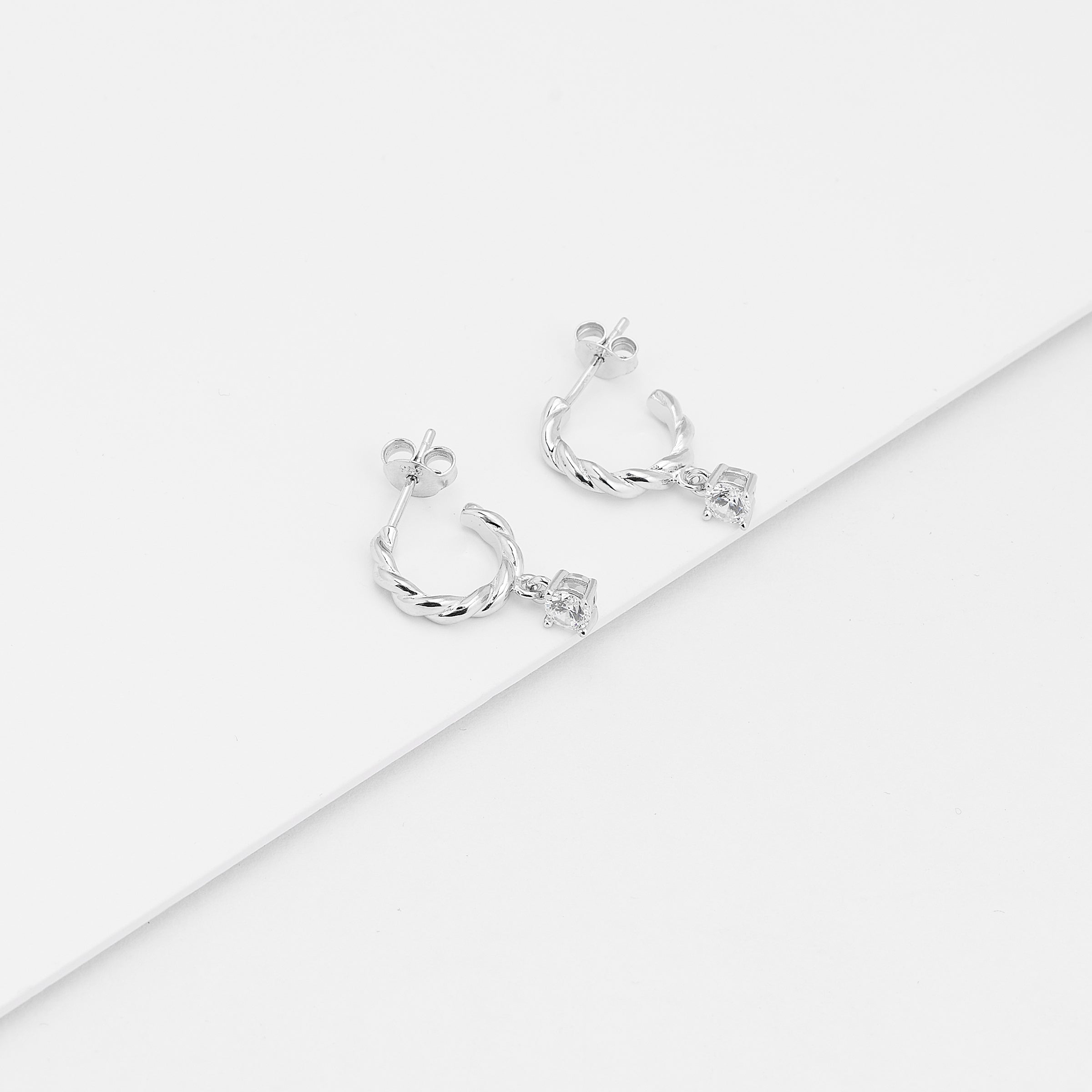 Sterling Silver Twist Hoop Earrings With Zirconia Drop