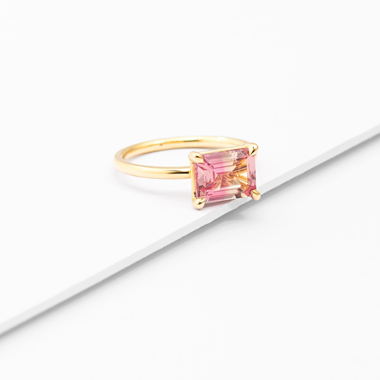 9K Yellow Gold Cr Orange And Yellow Sapphire 9x7mm Emerald Cut East West Ring