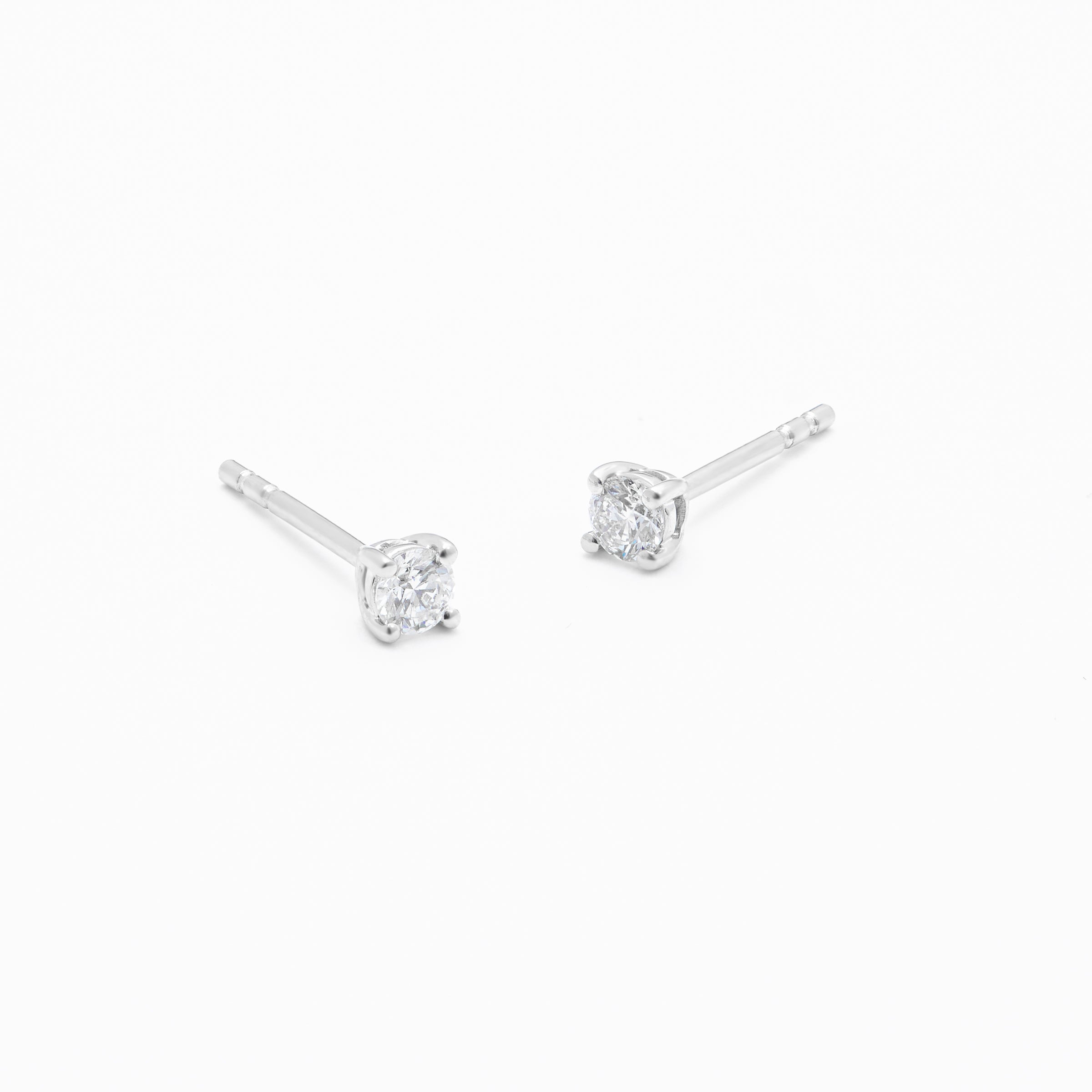 9K White Gold Round Brilliant Diamond Solitaire Stud Earrings 0.20tdw