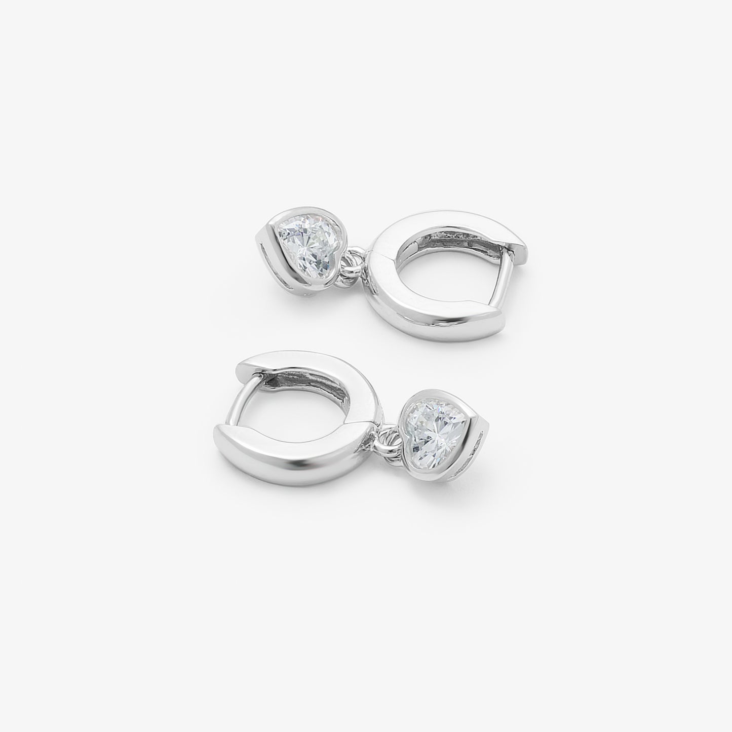 Sterling Silver Huggie Earrings With Dangling Zirconia Heart
