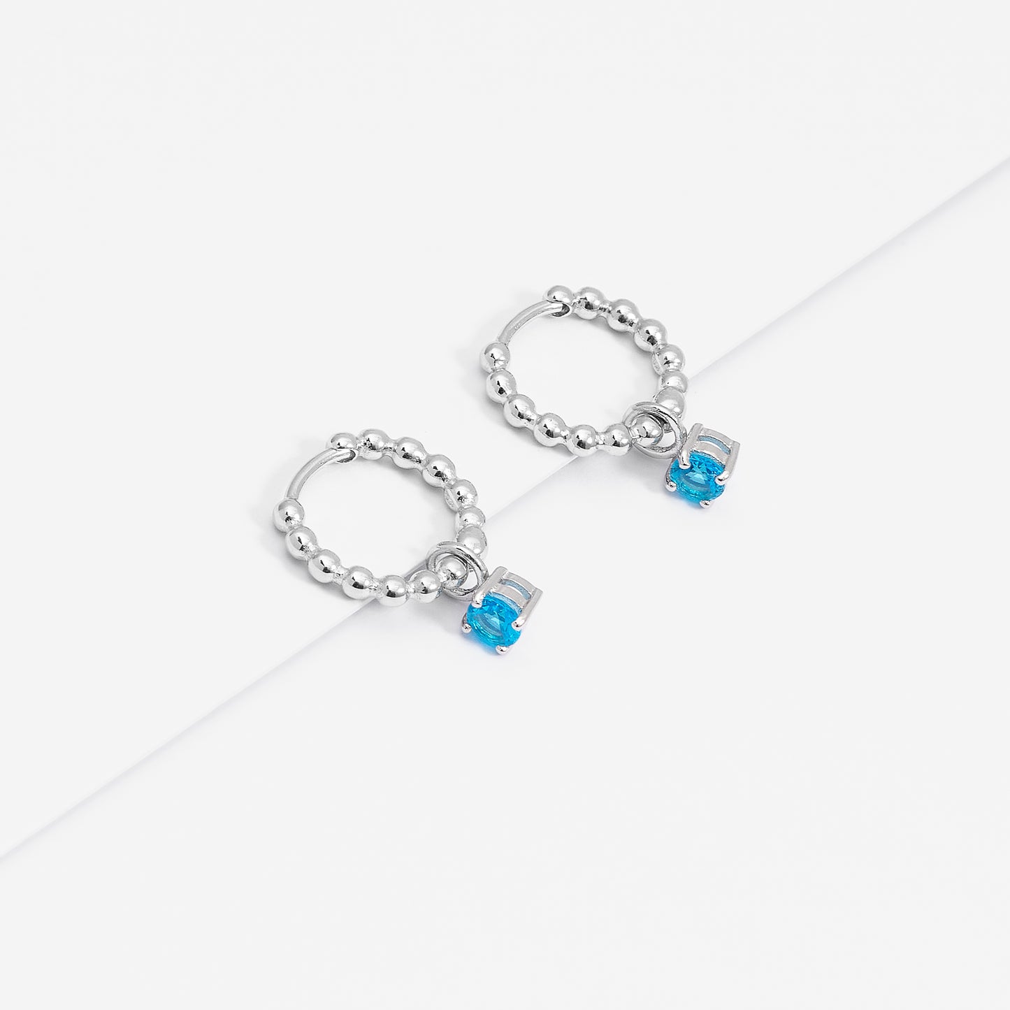 Sterling Silver Beaded Huggie Earrings With Blue Zirconia December Birthstone Drop