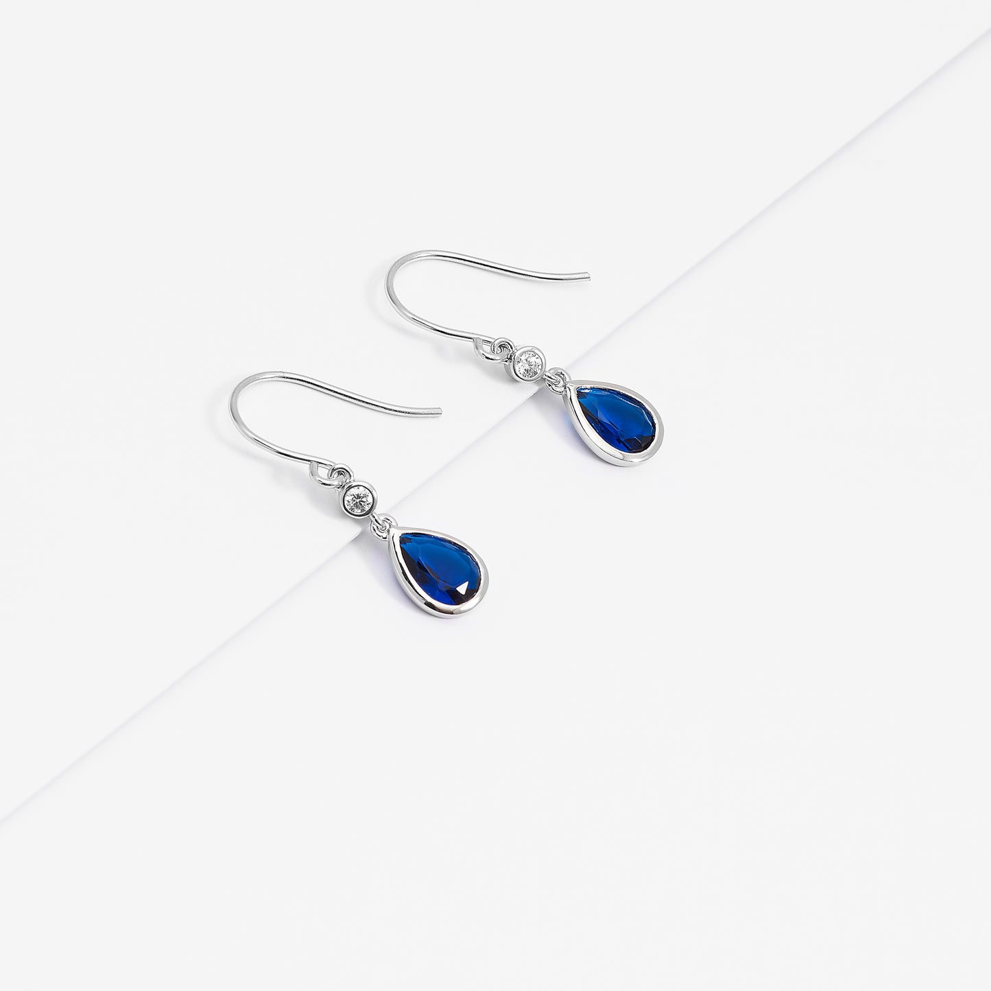 Sterling Silver Blue Pear And Round Zirconia Bezel Shepherd Hook Earrings