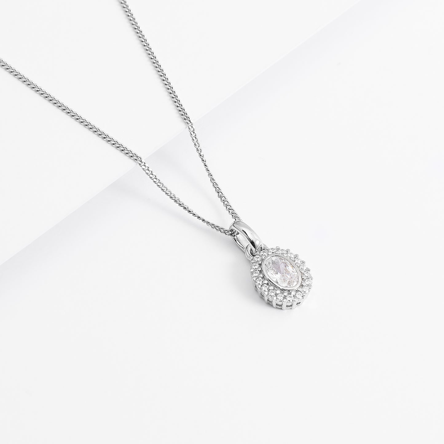 Sterling Silver Bezel Oval Zirconia Halo Pendant