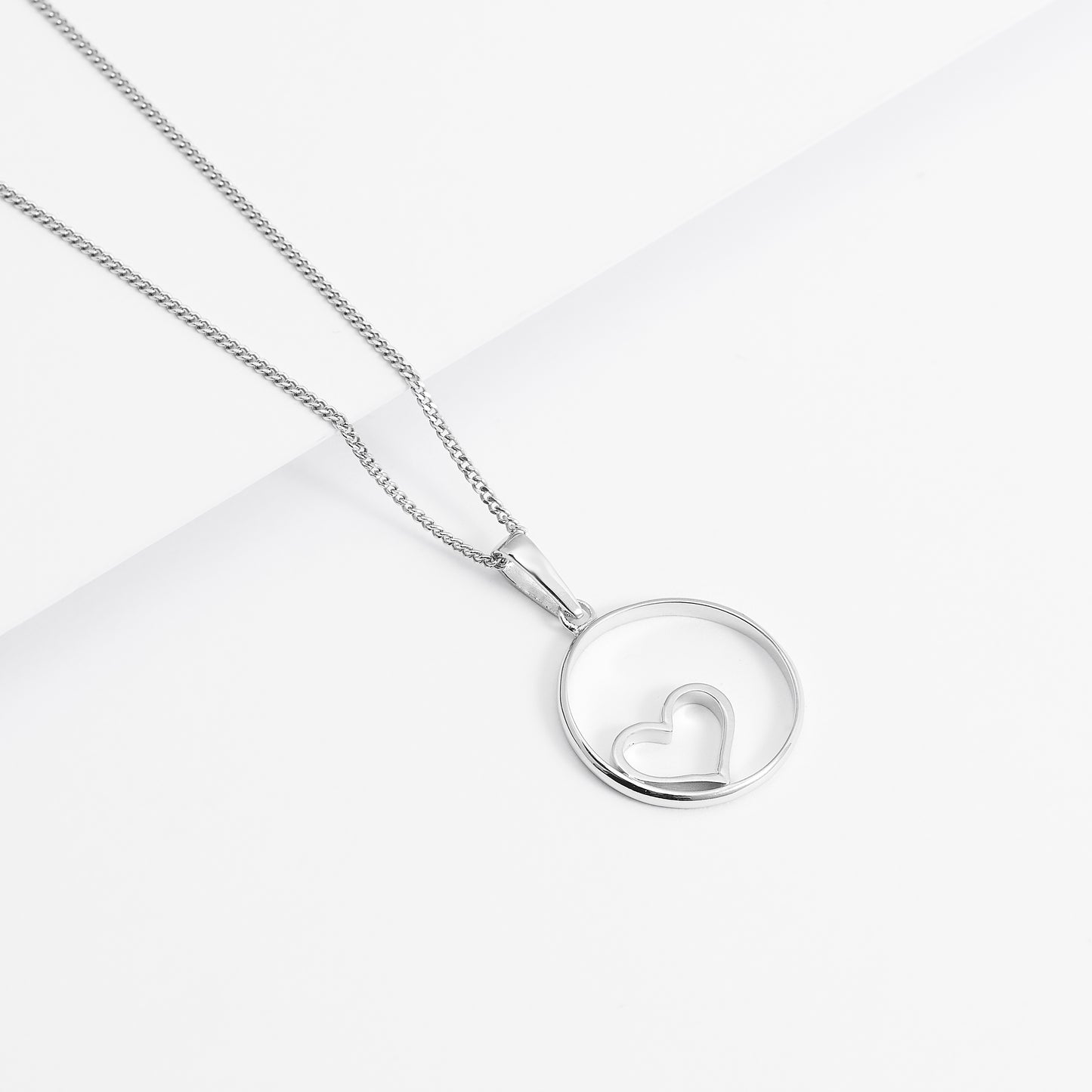 Sterling Silver Open Circle With Heart Pendant