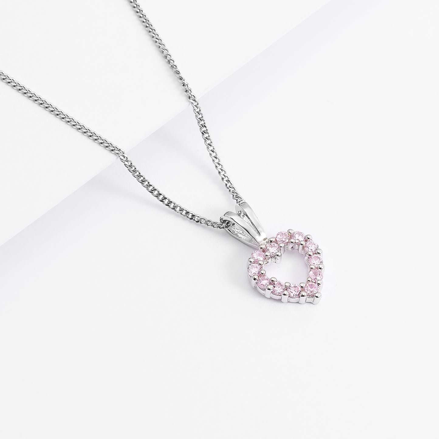 Sterling Silver Pink Zirconia Open Heart Pendant With Split Bail