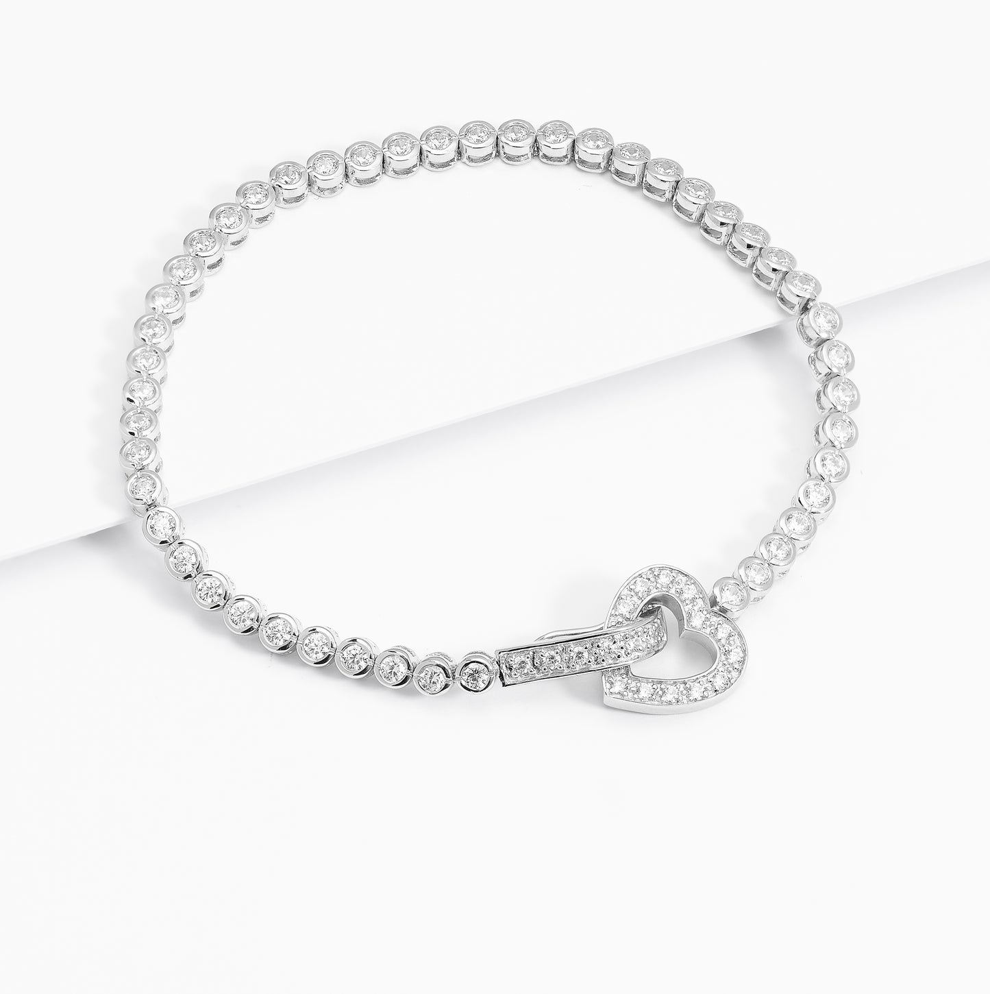 Sterling Silver Bezel Set Zirconia Tennis Bracelet With Heart Clasp 18cm