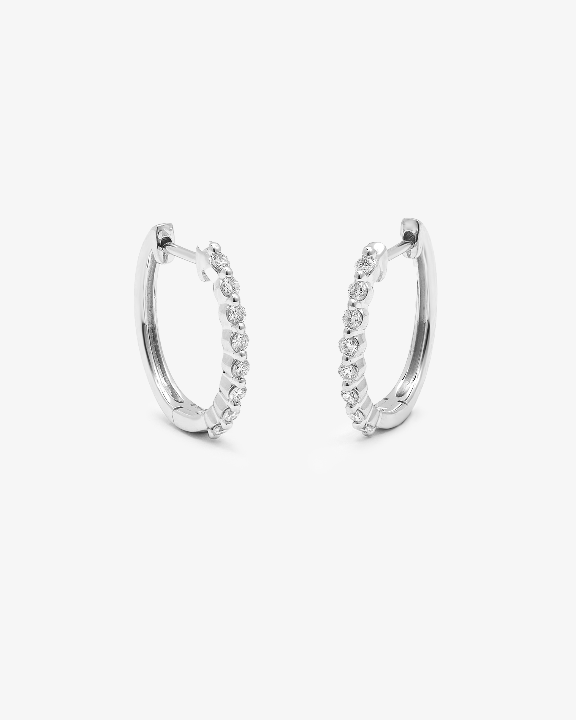 9K White Gold Round Brilliant Floating Lab Diamond Oval Huggie Earrings 0.24tdw