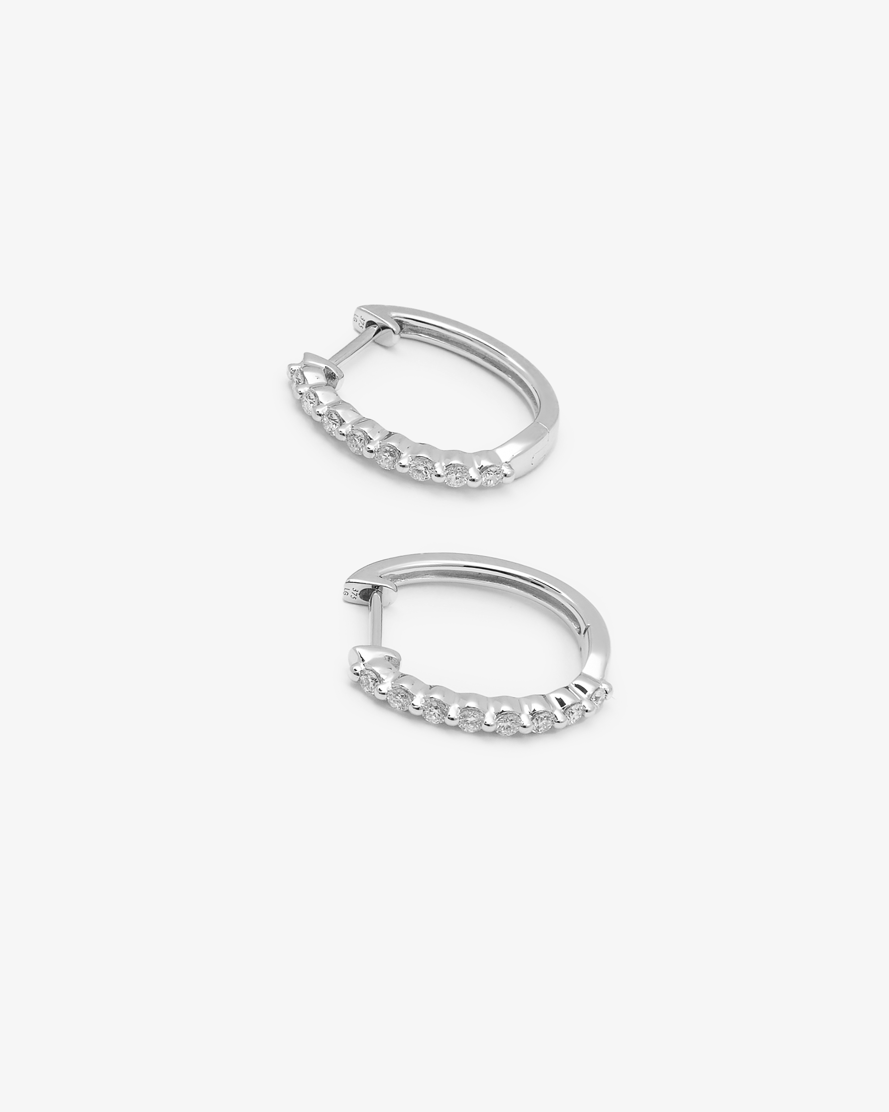 9K White Gold Round Brilliant Floating Lab Diamond Oval Huggie Earrings 0.24tdw