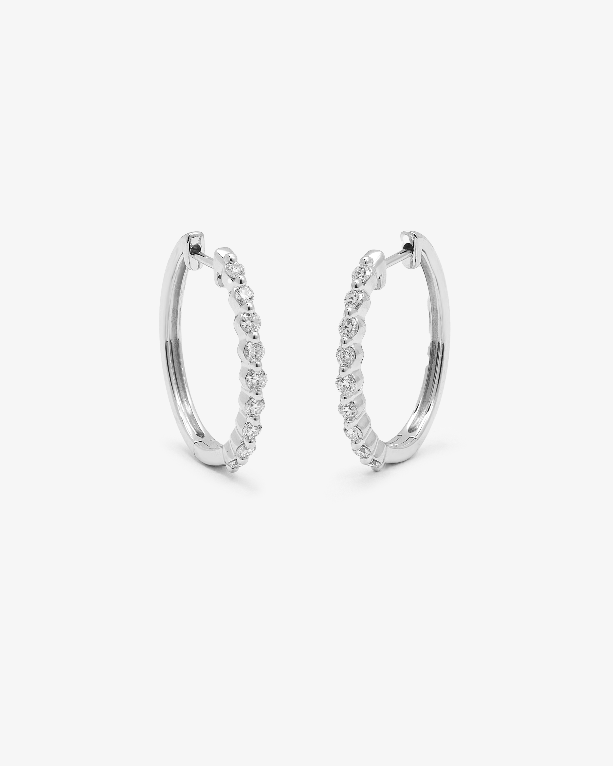 9K White Gold Round Brilliant Floating Lab Diamond Oval Huggie Earrings 0.5tdw