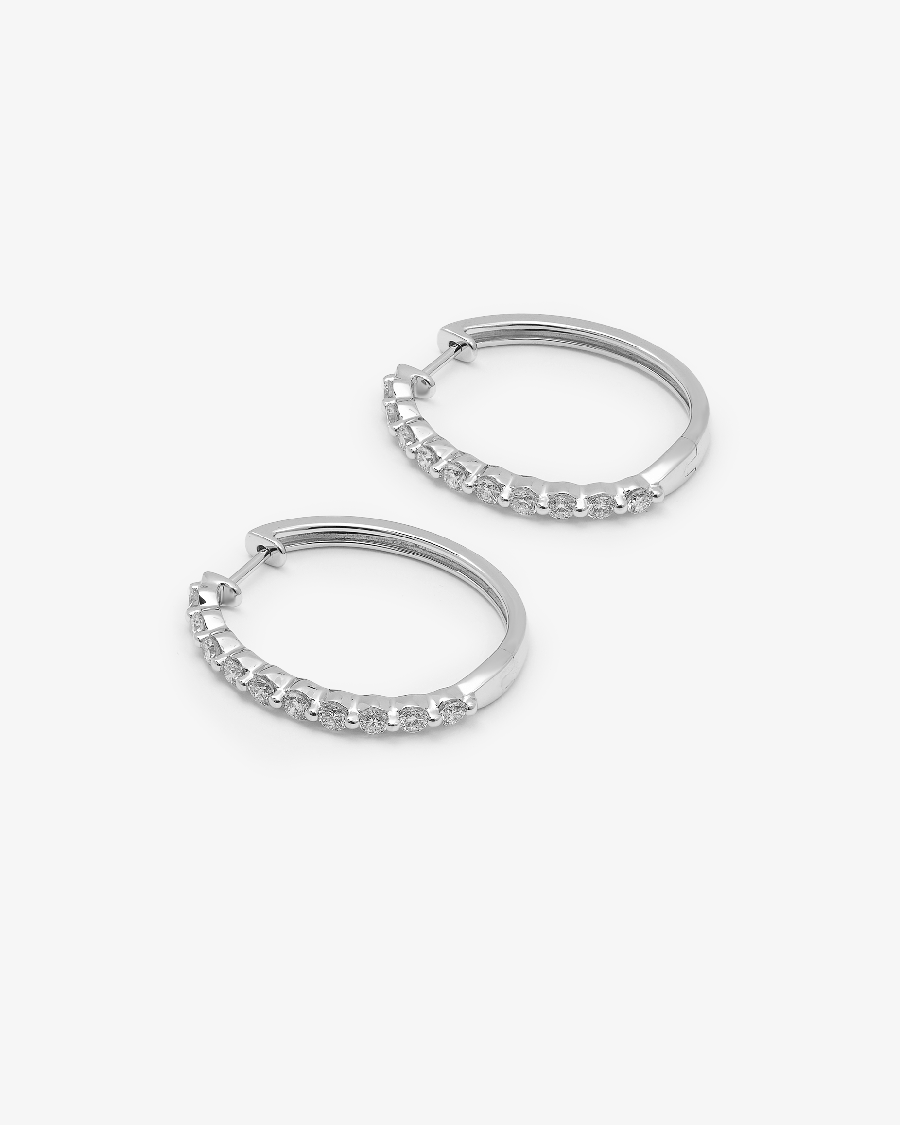 9K White Gold Round Brilliant Floating Lab Diamond Oval Huggie Earrings 1.0tdw