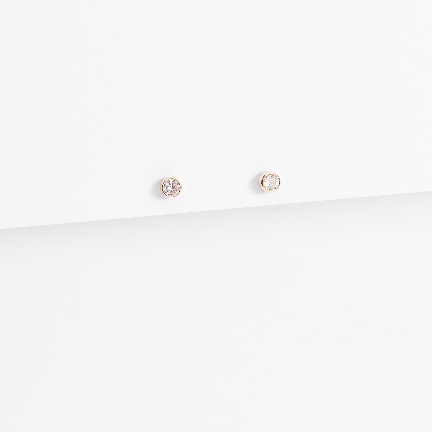 9K Yellow Gold Zirconia Bezel Stud Earrings